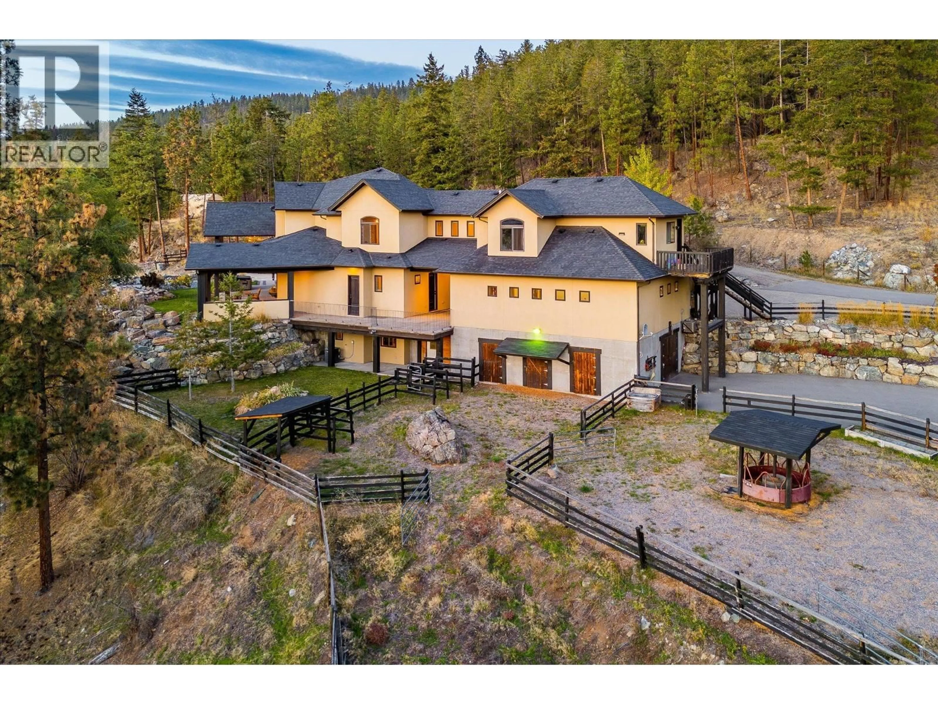 A pic from outside/outdoor area/front of a property/back of a property/a pic from drone, mountain view for 5500 ROCKFACE ROAD, Kelowna British Columbia V1X7V7