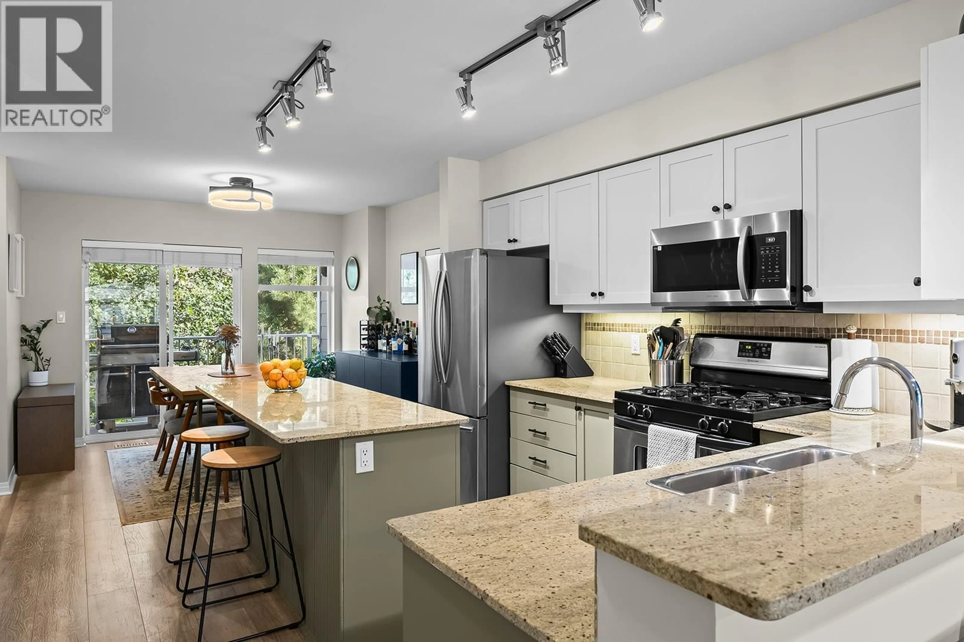 Open concept kitchen, ceramic/tile floor for 21 - 1853 PARKVIEW CRESCENT, Kelowna British Columbia V1X8A3