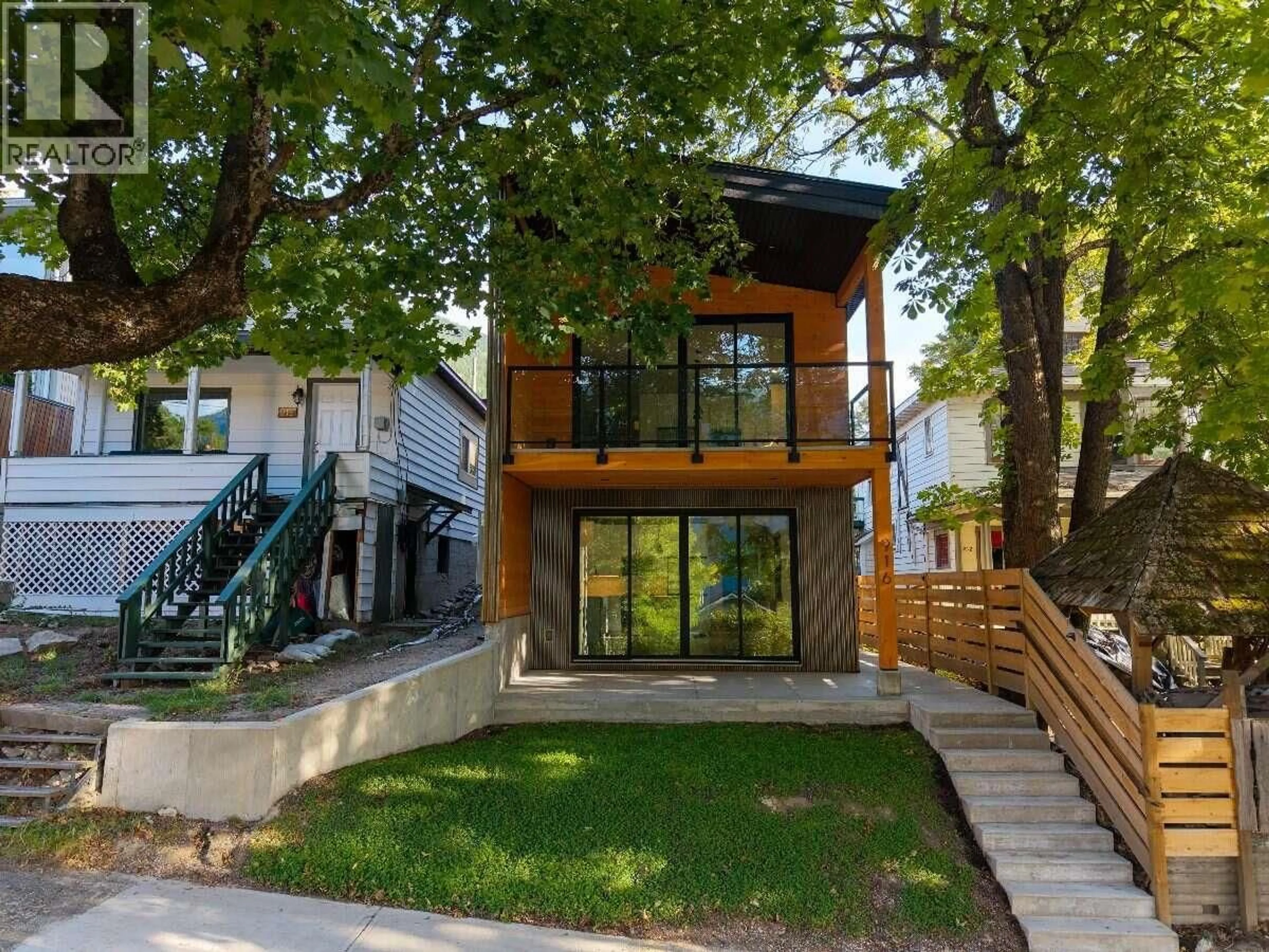 Home with brick exterior material, street for 1 - 916 CARBONATE STREET, Nelson British Columbia V1L4R4