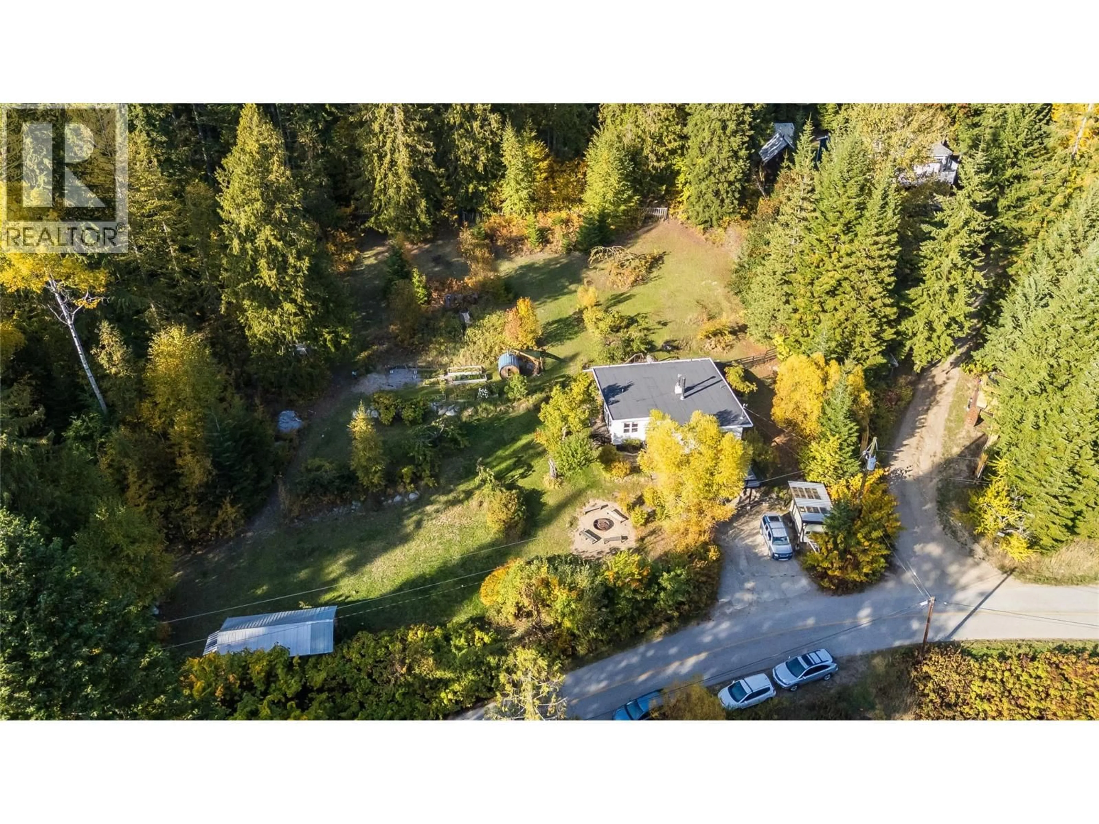 A pic from outside/outdoor area/front of a property/back of a property/a pic from drone, forest/trees view for 5995 LONGBEACH ROAD, Nelson British Columbia V1L6P3