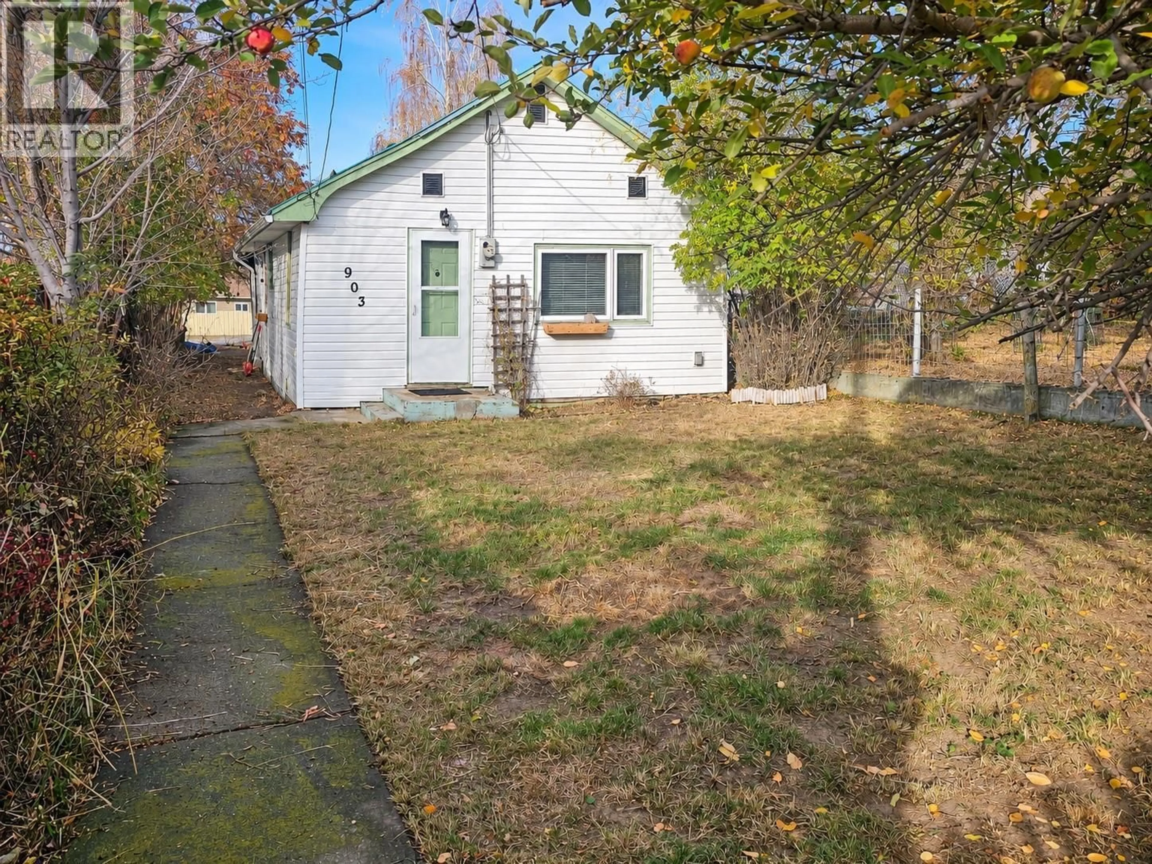 A pic from outside/outdoor area/front of a property/back of a property/a pic from drone, street for 903 5A STREET, Cranbrook British Columbia V1C1K7