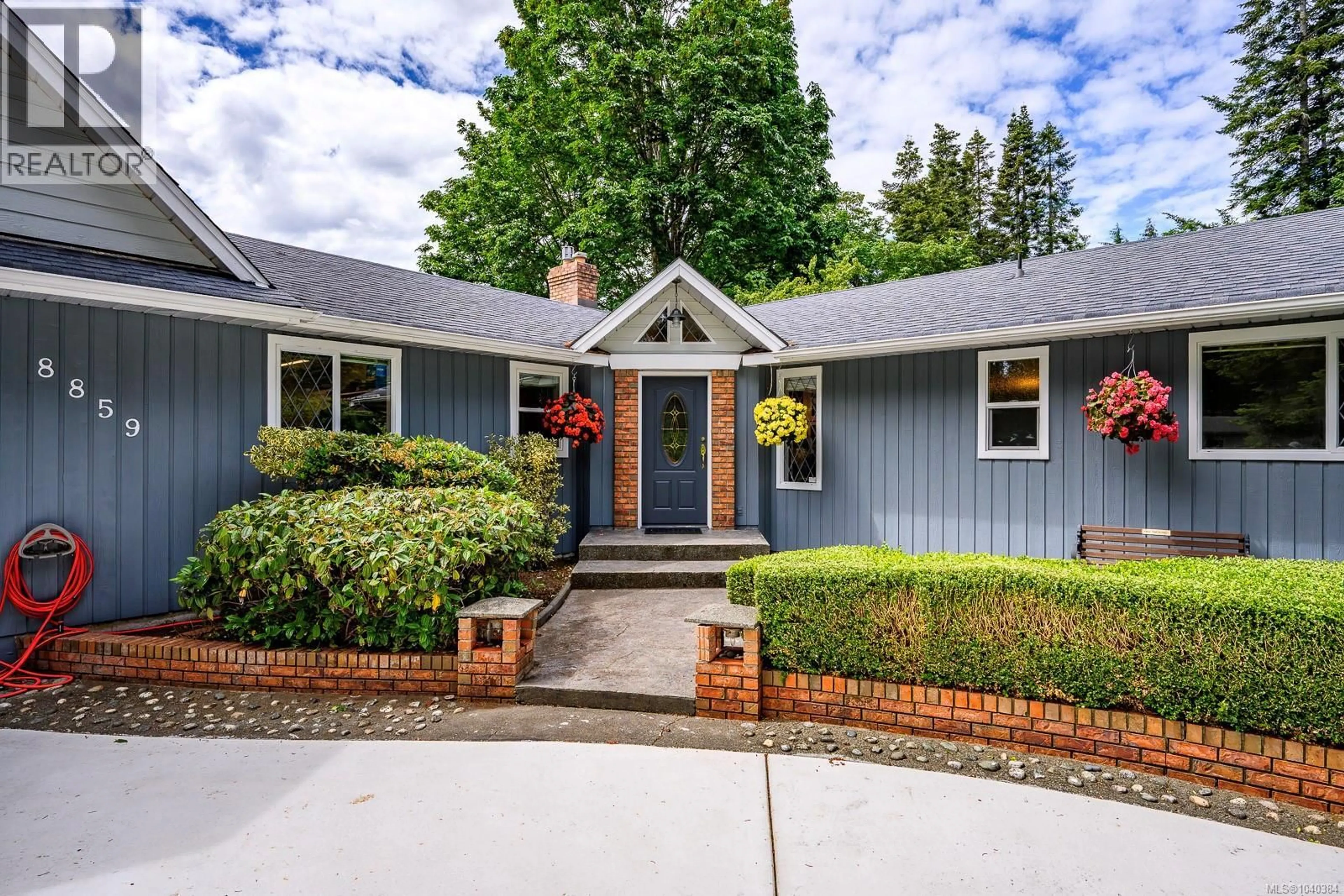 Home with brick exterior material, street for 8859 HENDERSON AVENUE, Black Creek British Columbia V9J1A6