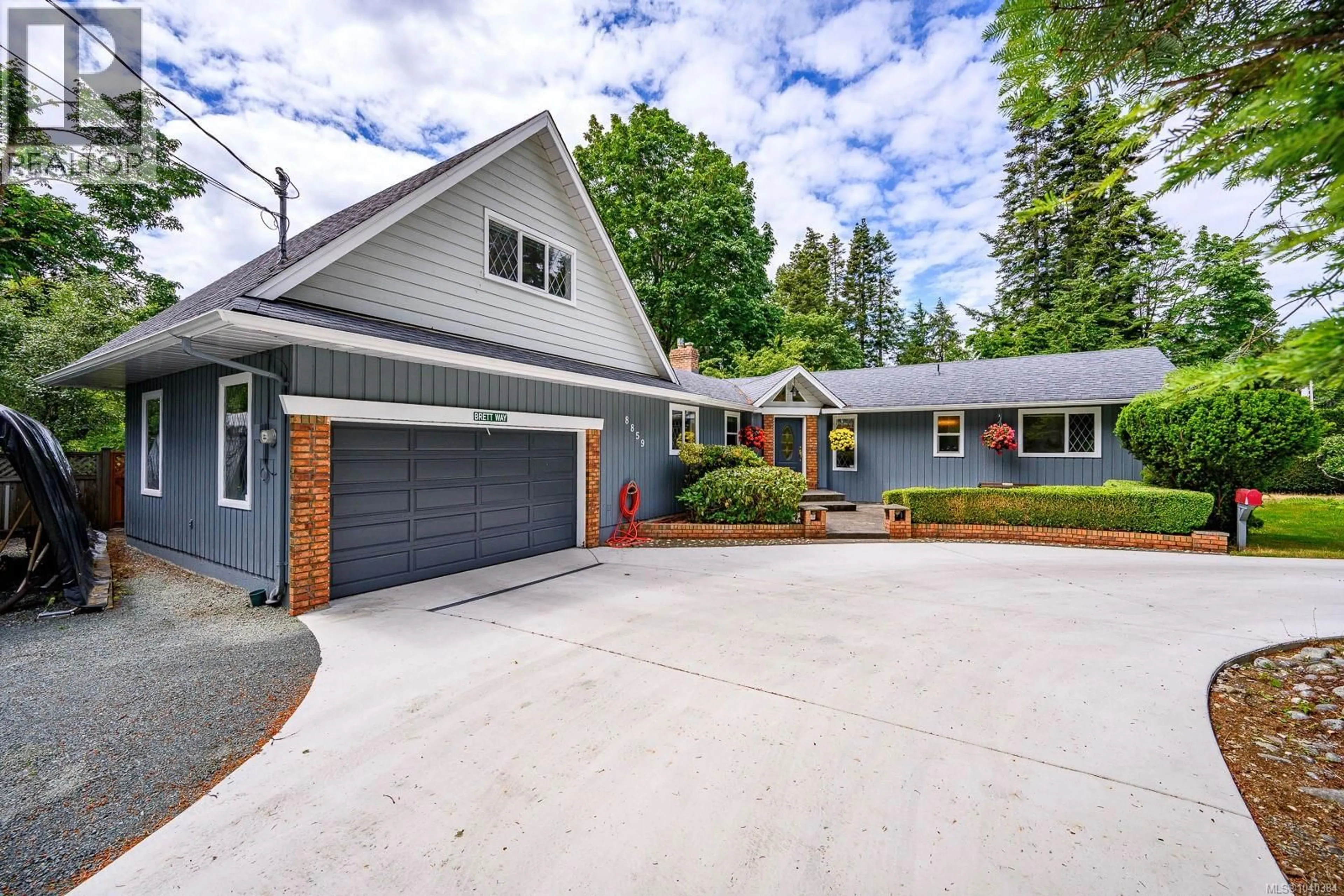 Home with brick exterior material, street for 8859 HENDERSON AVENUE, Black Creek British Columbia V9J1A6