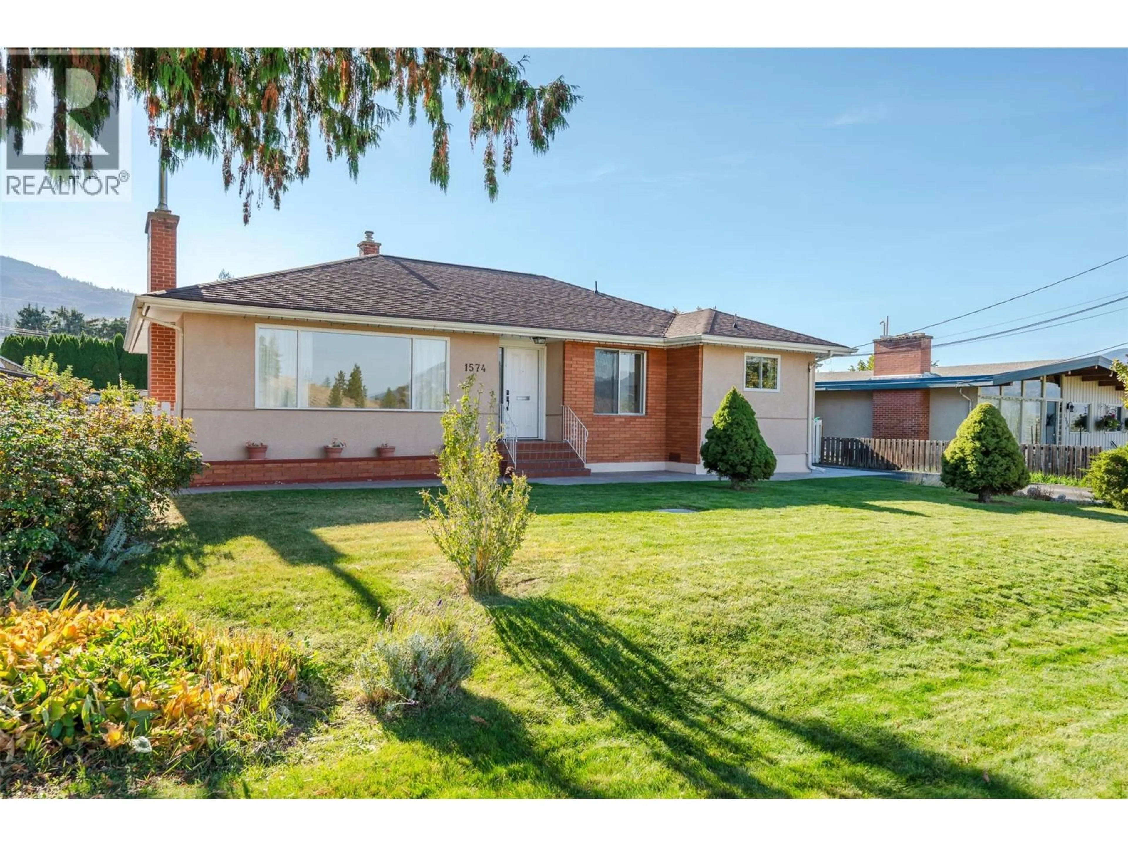 Home with brick exterior material, street for 1574 RIDGEDALE AVENUE, Penticton British Columbia V2A2S4