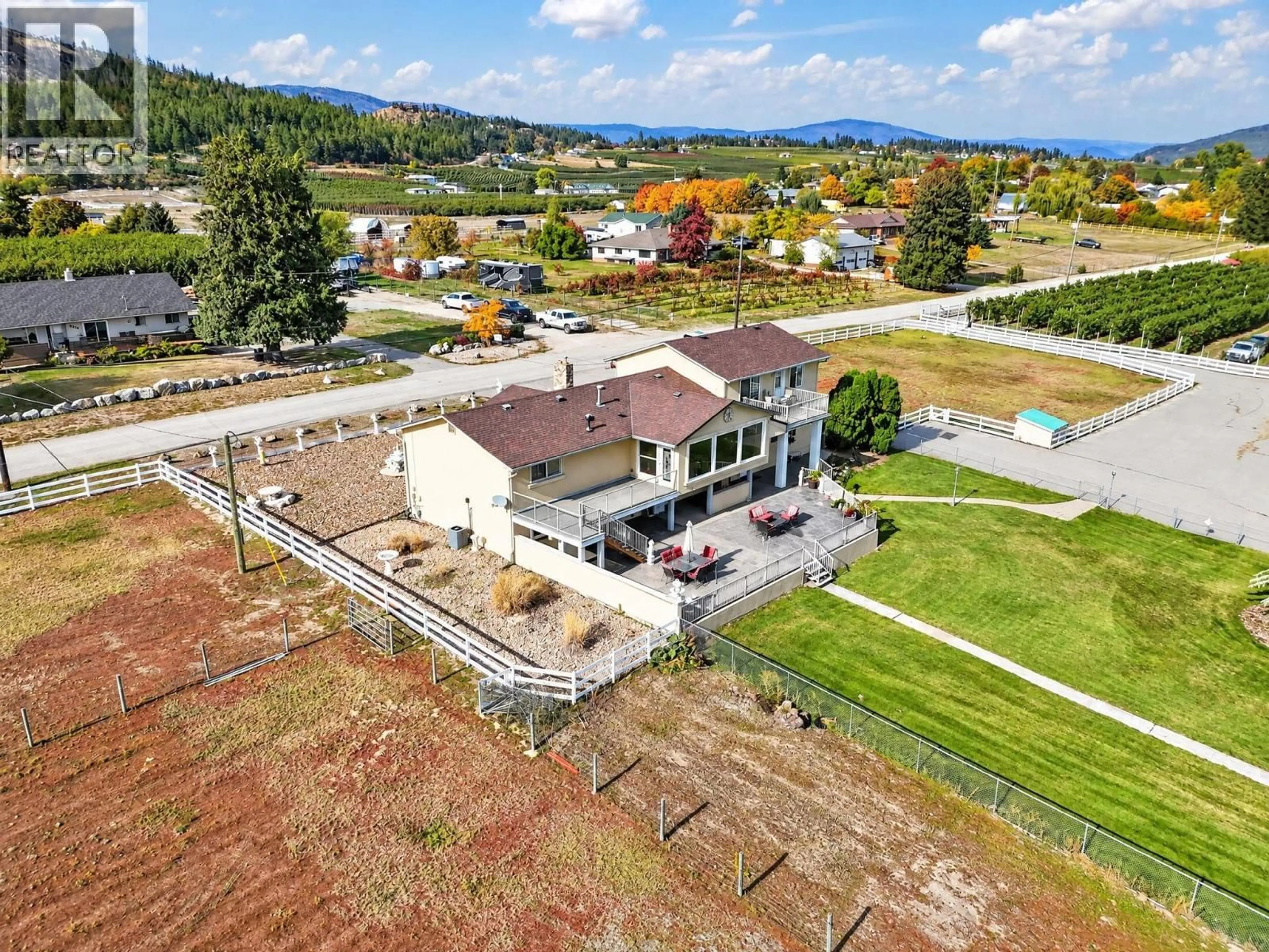 A pic from outside/outdoor area/front of a property/back of a property/a pic from drone, unknown for 9771 READ ROAD, Lake Country British Columbia V4V1M2