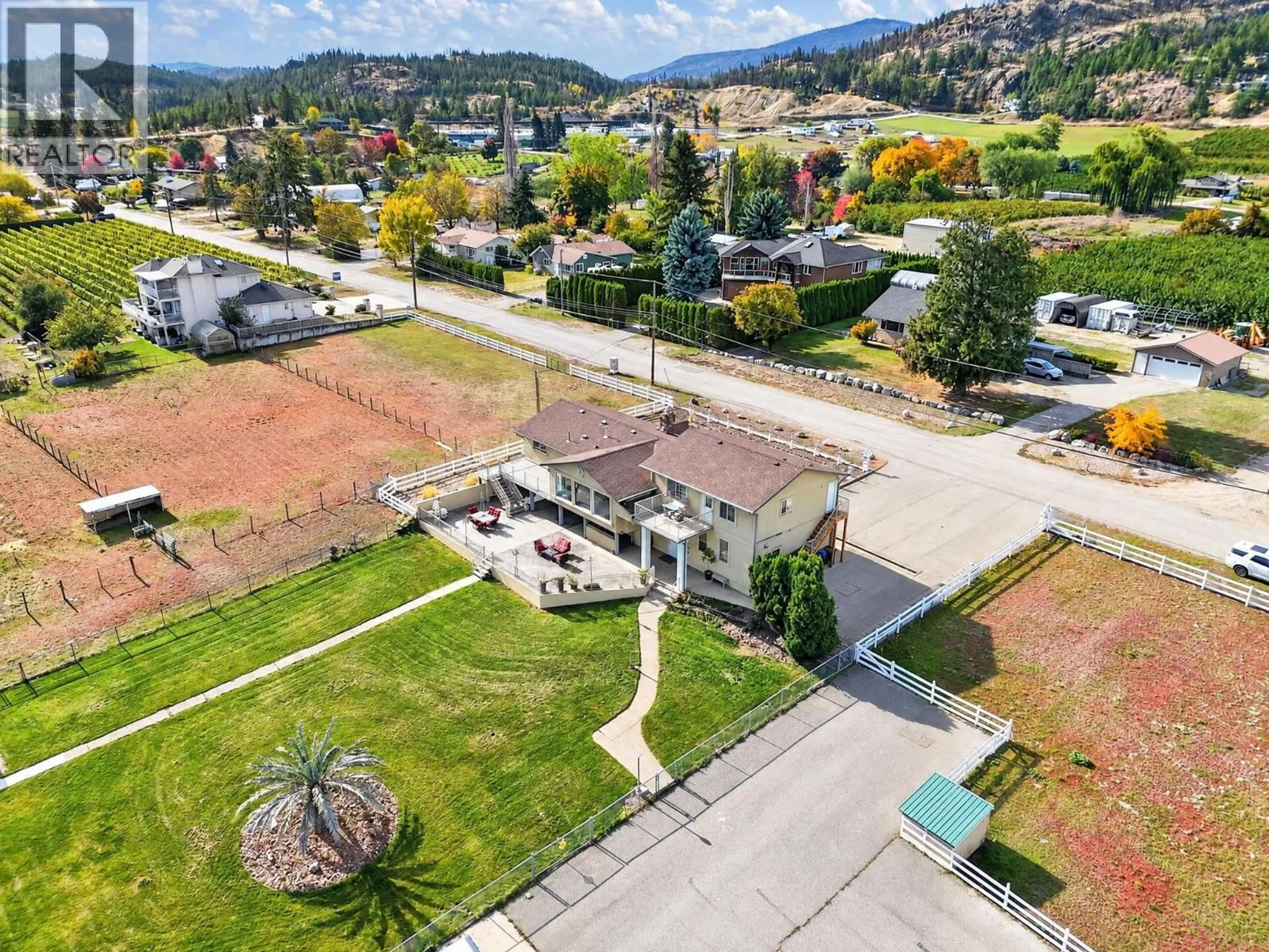 A pic from outside/outdoor area/front of a property/back of a property/a pic from drone, mountain view for 9771 READ ROAD, Lake Country British Columbia V4V1M2
