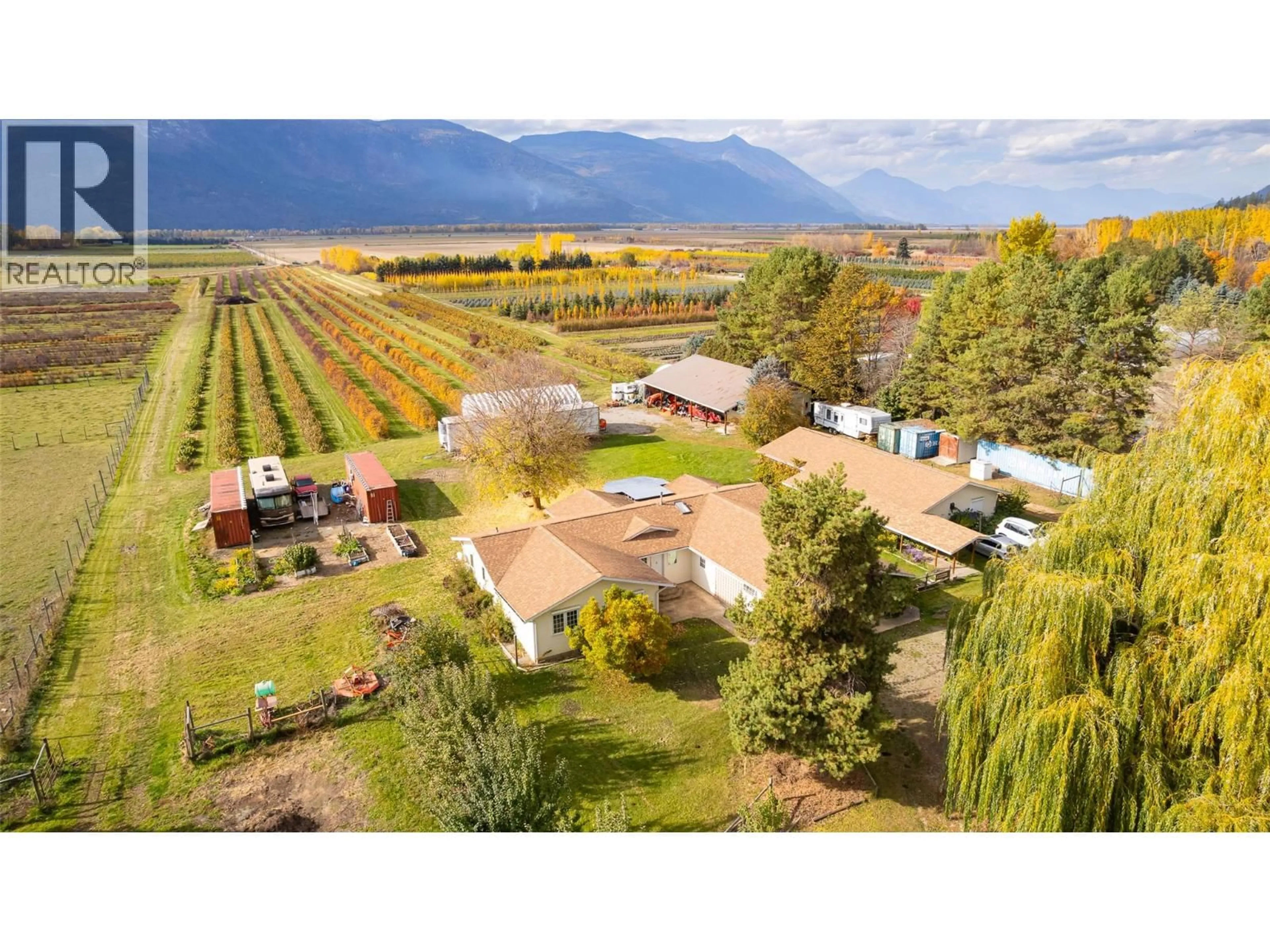 A pic from outside/outdoor area/front of a property/back of a property/a pic from drone, mountain view for 1331 CHANNEL ROAD, Wynndel British Columbia V0B2N1