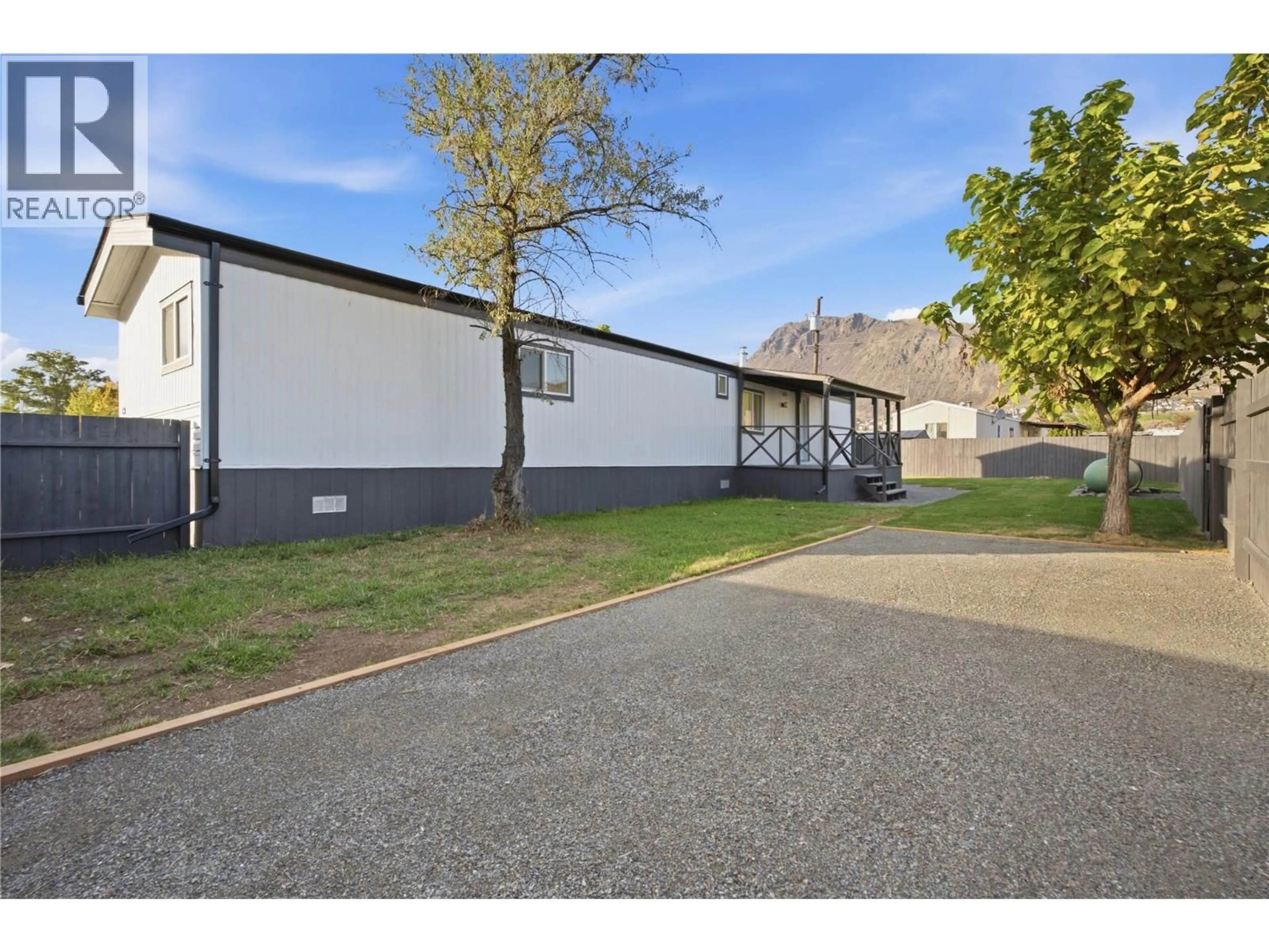 A pic from outside/outdoor area/front of a property/back of a property/a pic from drone, street for C3 - 220 G & M ROAD, Kamloops British Columbia V2H1A4