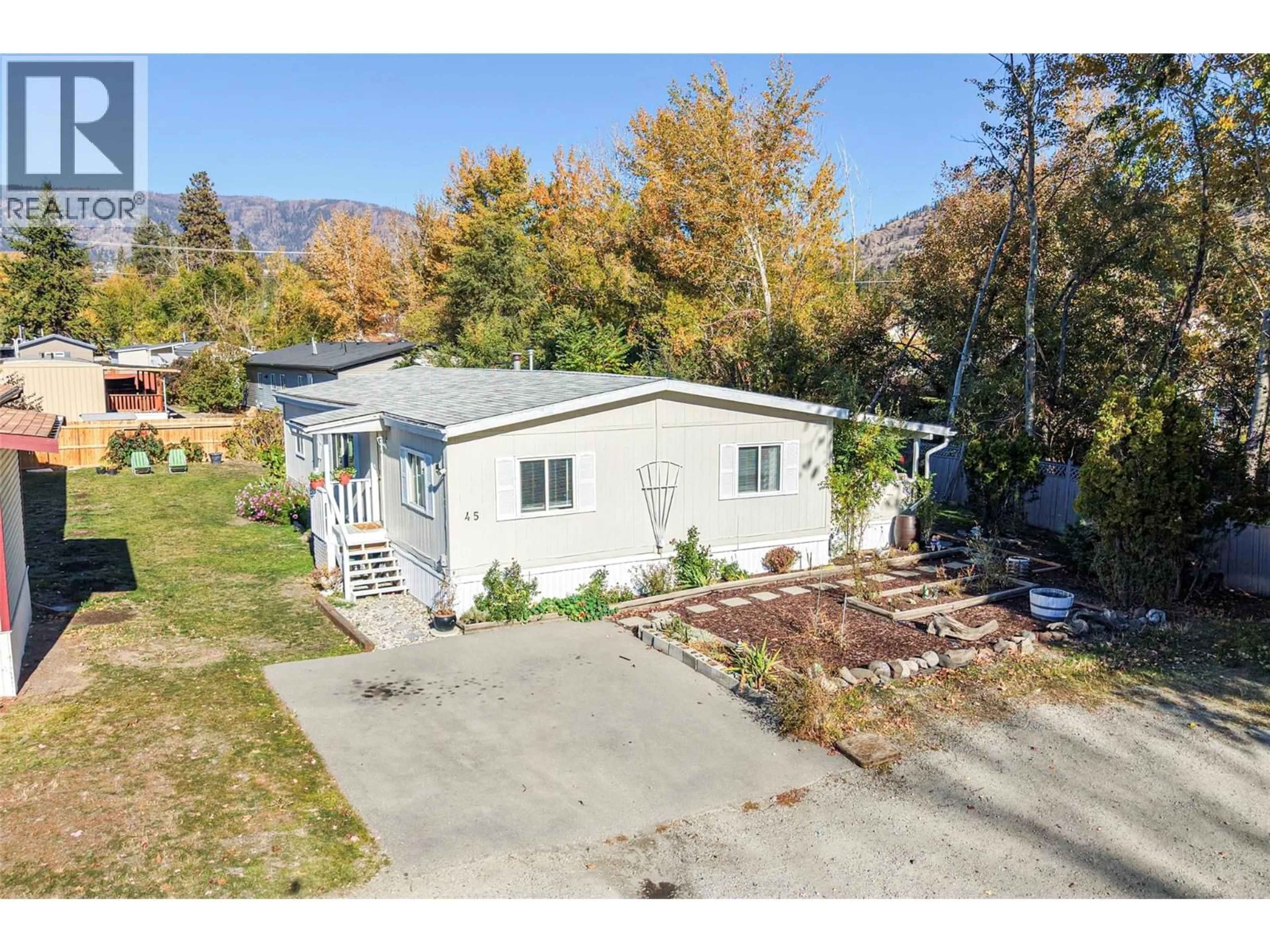 A pic from outside/outdoor area/front of a property/back of a property/a pic from drone, unknown for 45 - 1881 BOUCHERIE ROAD, West Kelowna British Columbia V4T1Z2