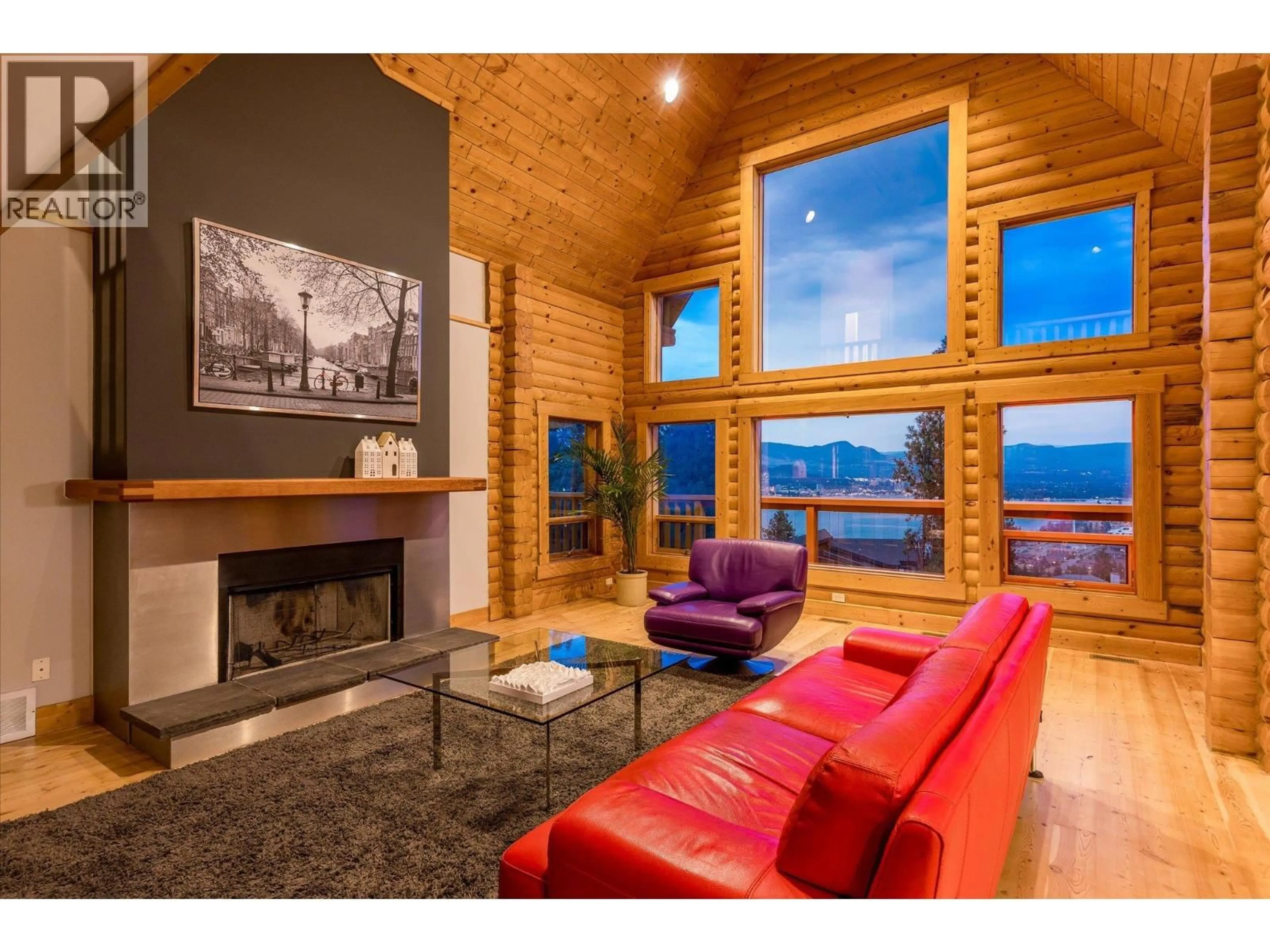 Living room with furniture, wood/laminate floor for 1469 VANCOUVER ROAD, West Kelowna British Columbia V1Z2X6
