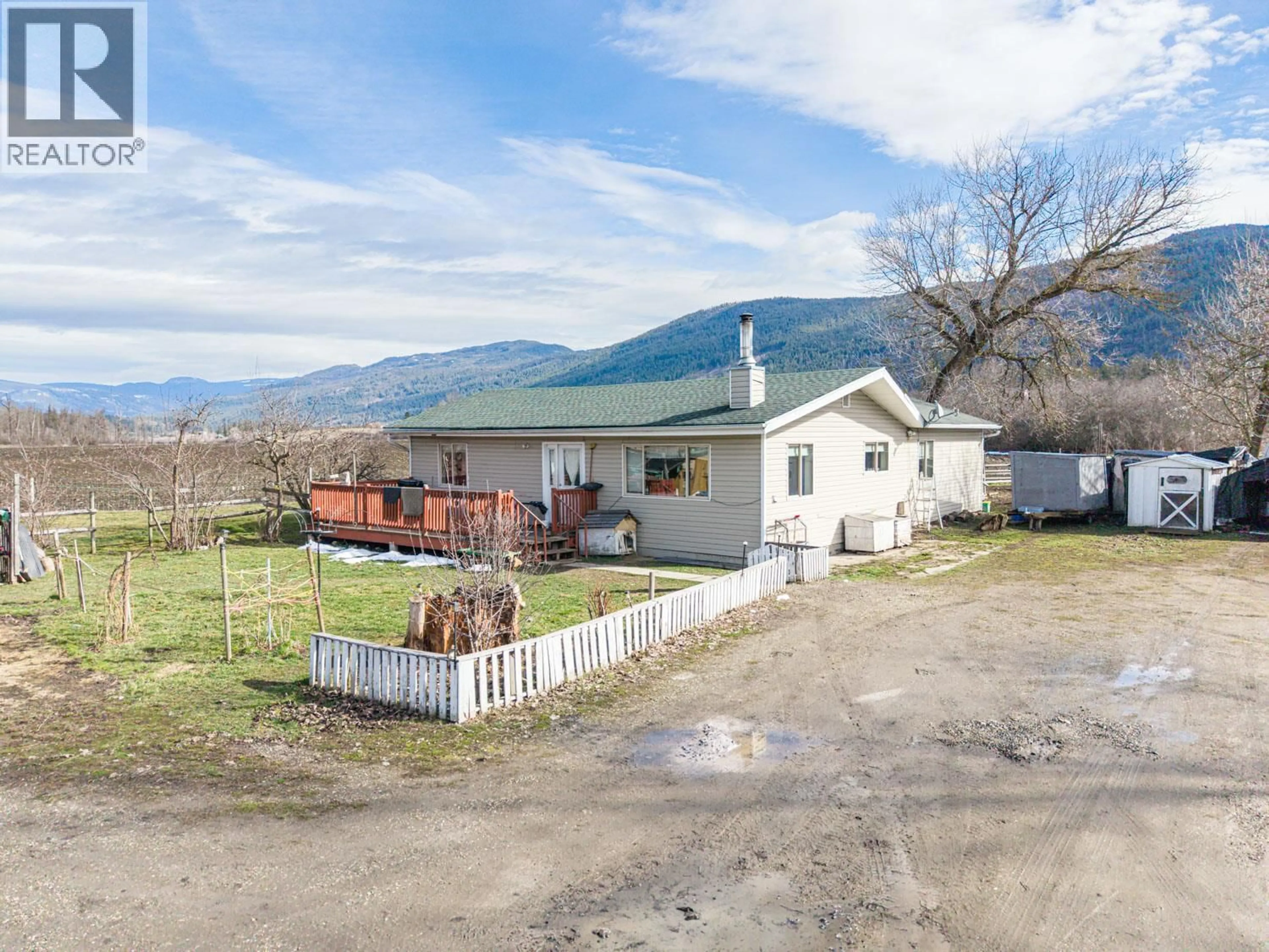 A pic from outside/outdoor area/front of a property/back of a property/a pic from drone, mountain view for 4536 97A HIGHWAY, Spallumcheen British Columbia V4Y0S1