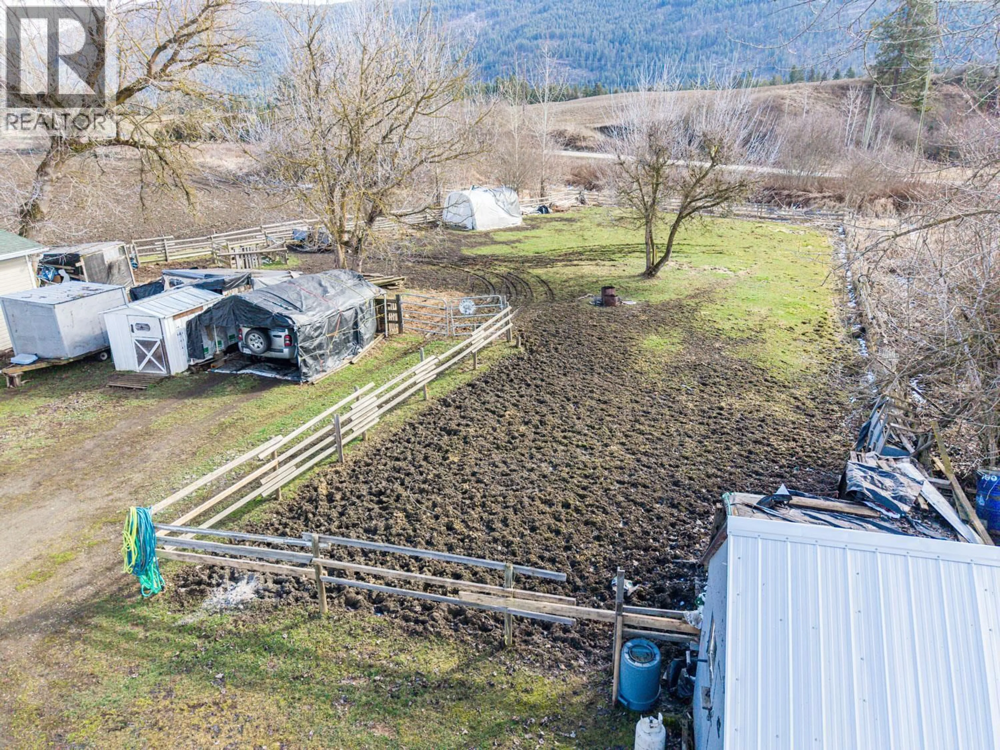 A pic from outside/outdoor area/front of a property/back of a property/a pic from drone, unknown for 4536 97A HIGHWAY, Spallumcheen British Columbia V4Y0S1