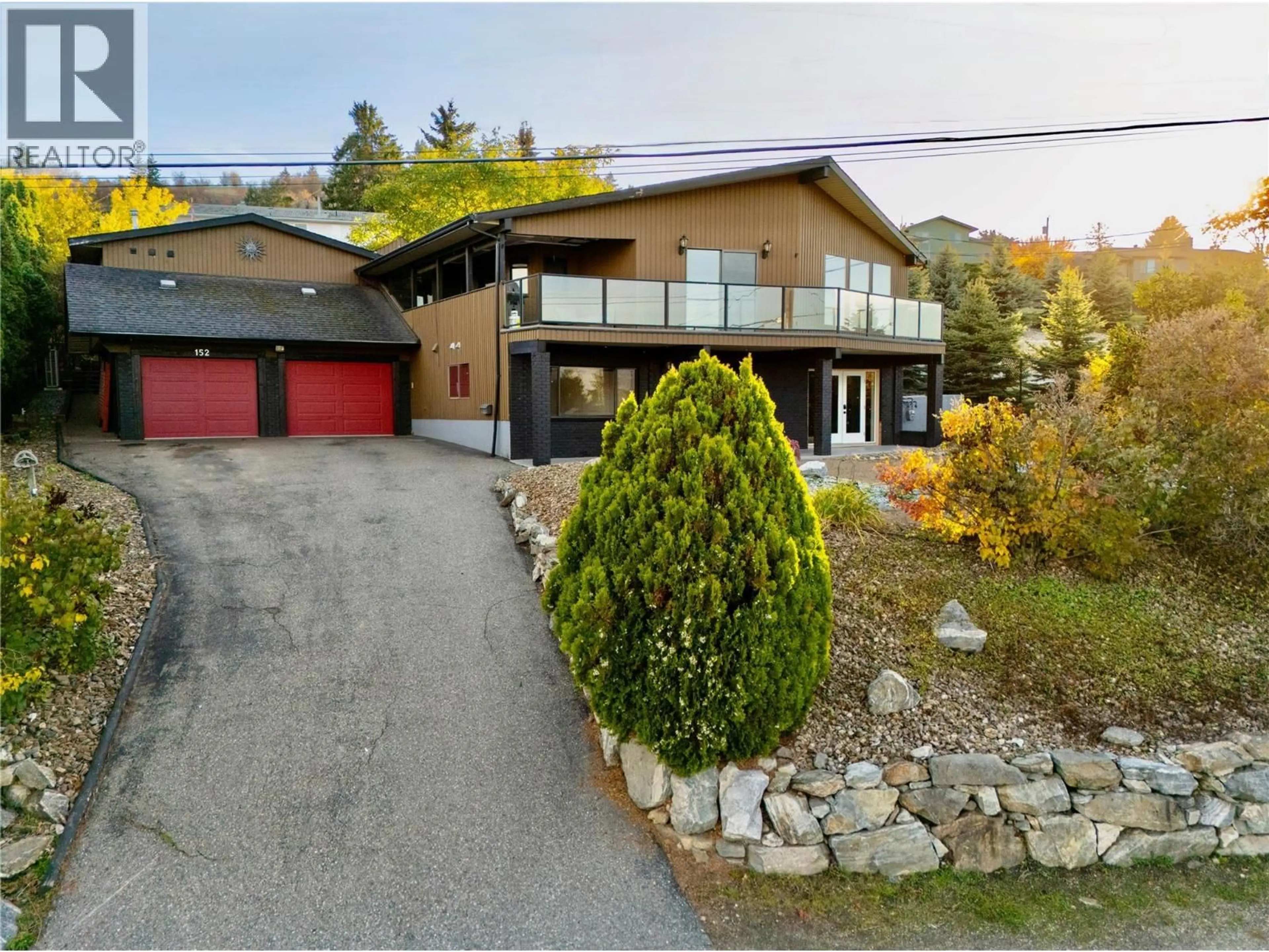 A pic from outside/outdoor area/front of a property/back of a property/a pic from drone, street for 152 LINDSAY ROAD, Vernon British Columbia V1B2H7