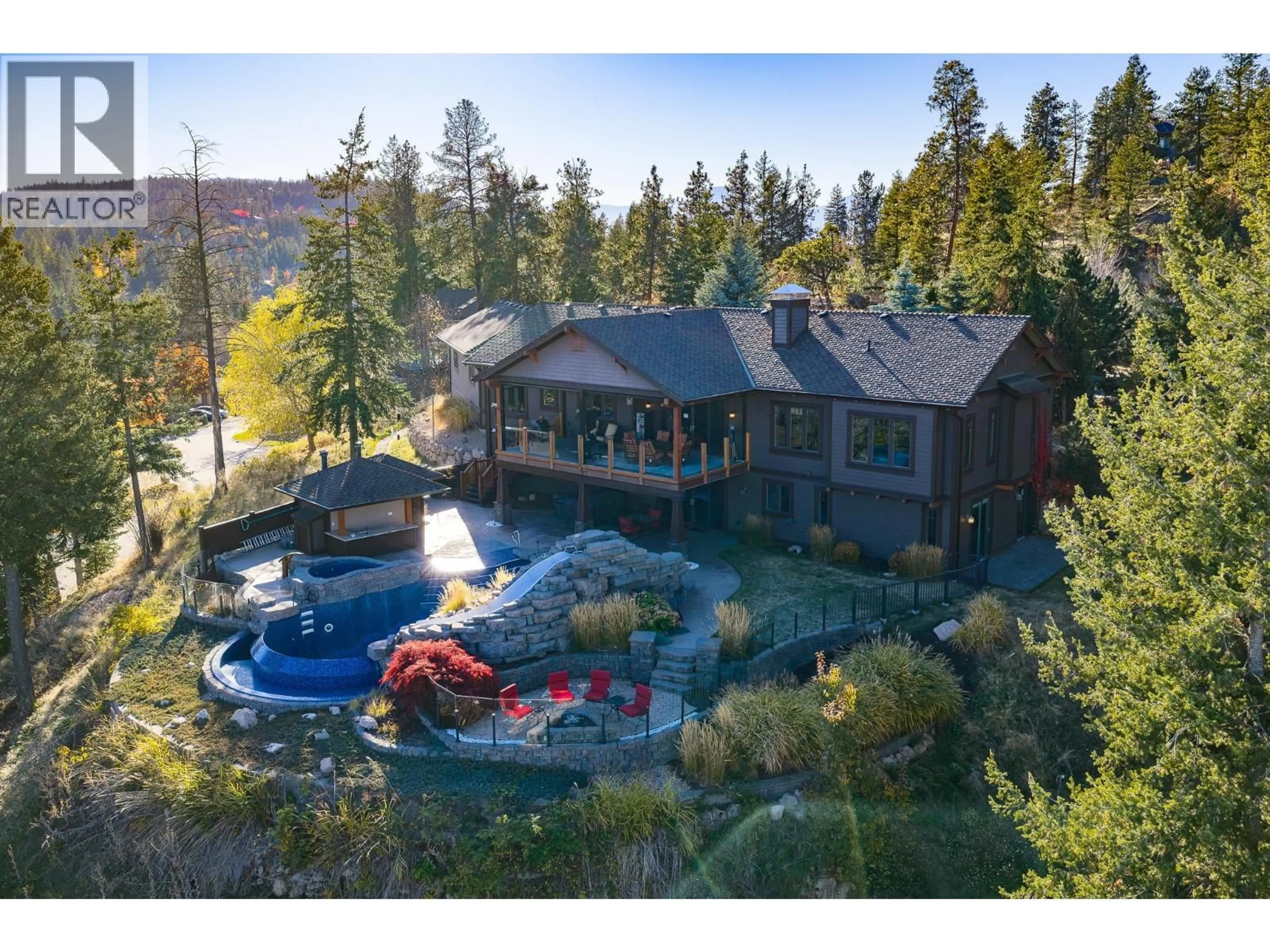 A pic from outside/outdoor area/front of a property/back of a property/a pic from drone, unknown for 532 FALCON POINT WAY, Vernon British Columbia V1H1Y4