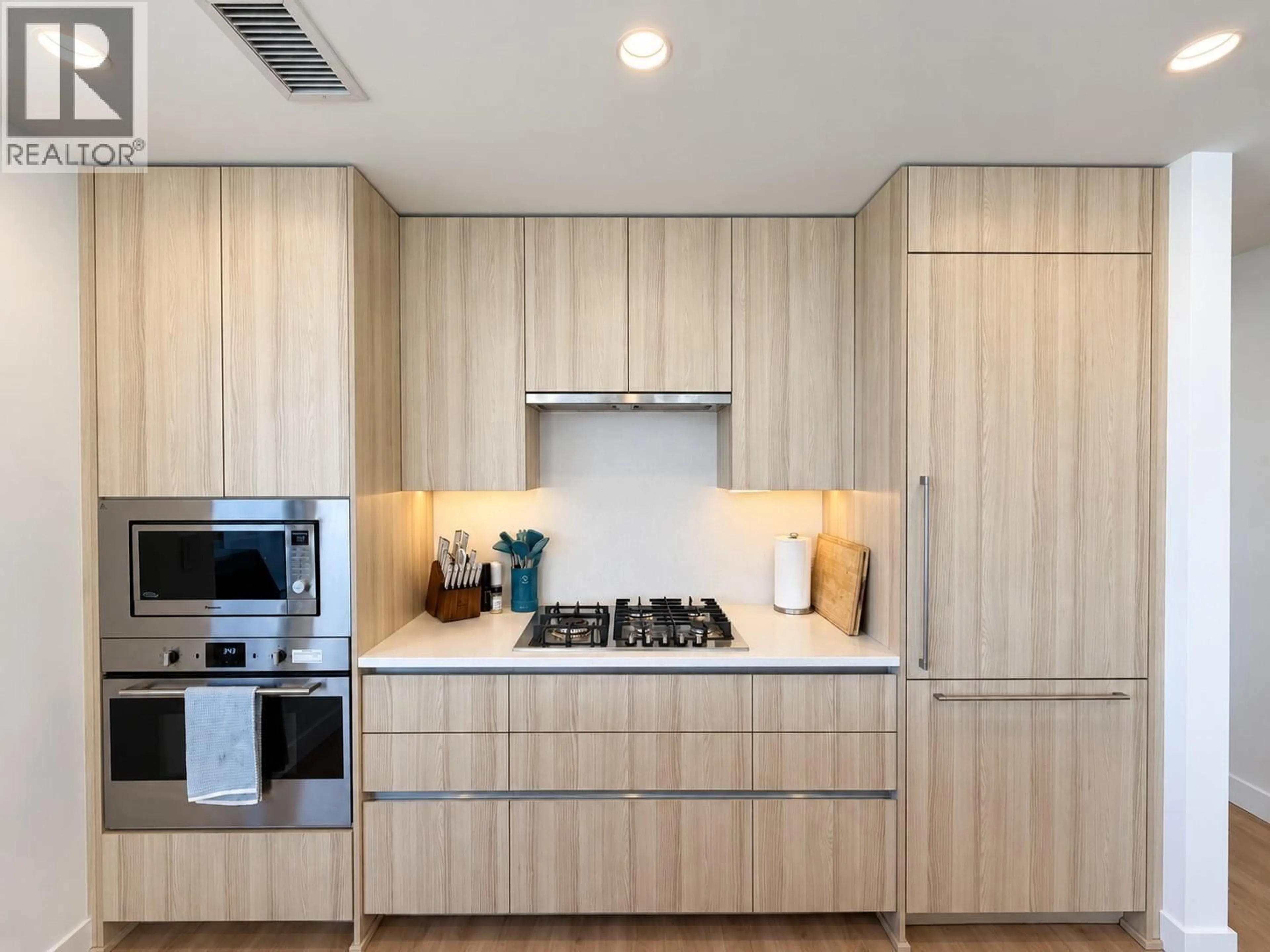 Contemporary kitchen, wood/laminate floor for 2109 - 1626 WATER STREET, Kelowna British Columbia V1Y1J9