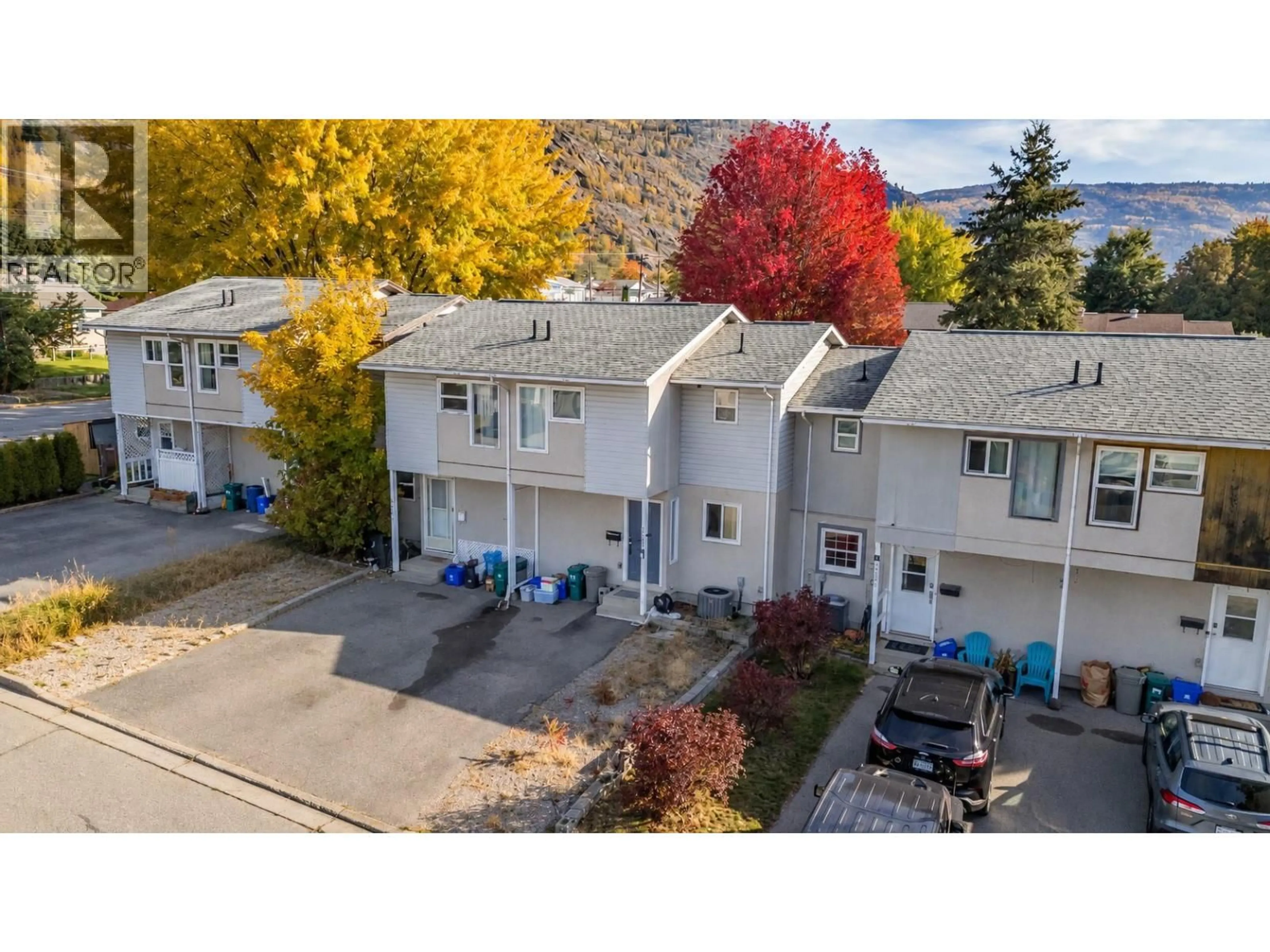 A pic from outside/outdoor area/front of a property/back of a property/a pic from drone, mountain view for 3307 LAUREL CRESCENT, Trail British Columbia V1R4M6