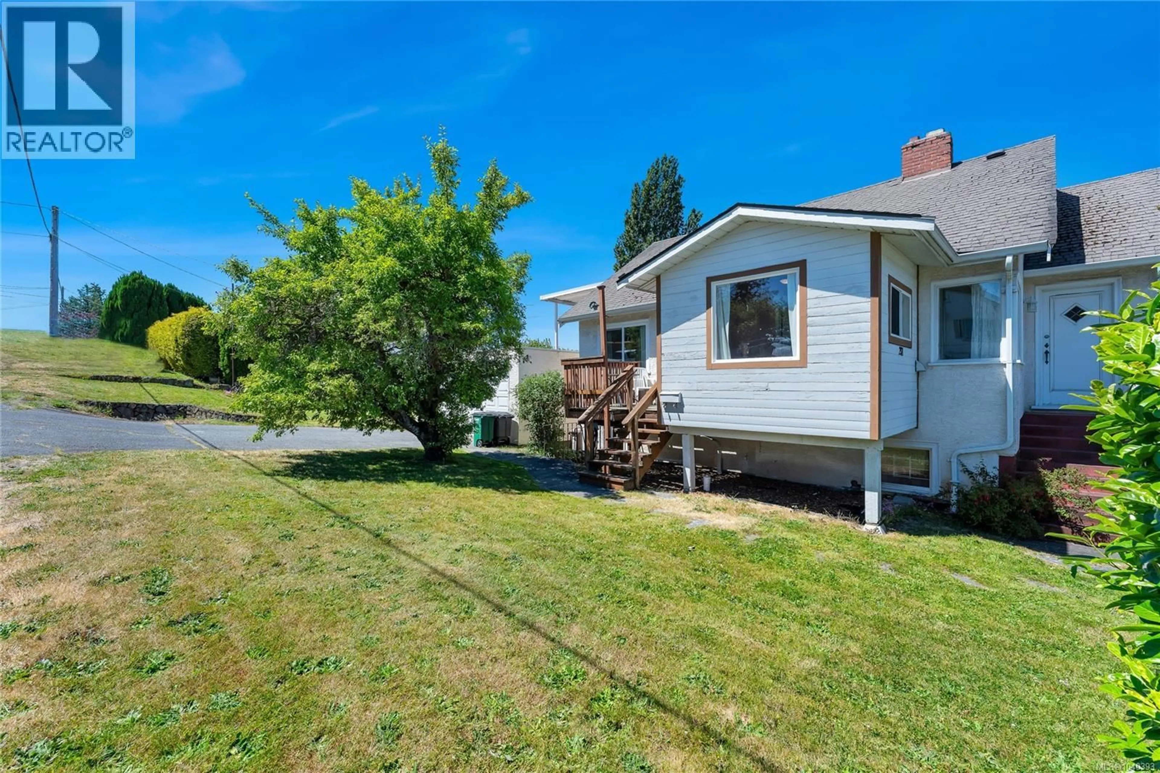 A pic from outside/outdoor area/front of a property/back of a property/a pic from drone, unknown for 201 BURNSIDE ROAD, Saanich British Columbia V9A1C4