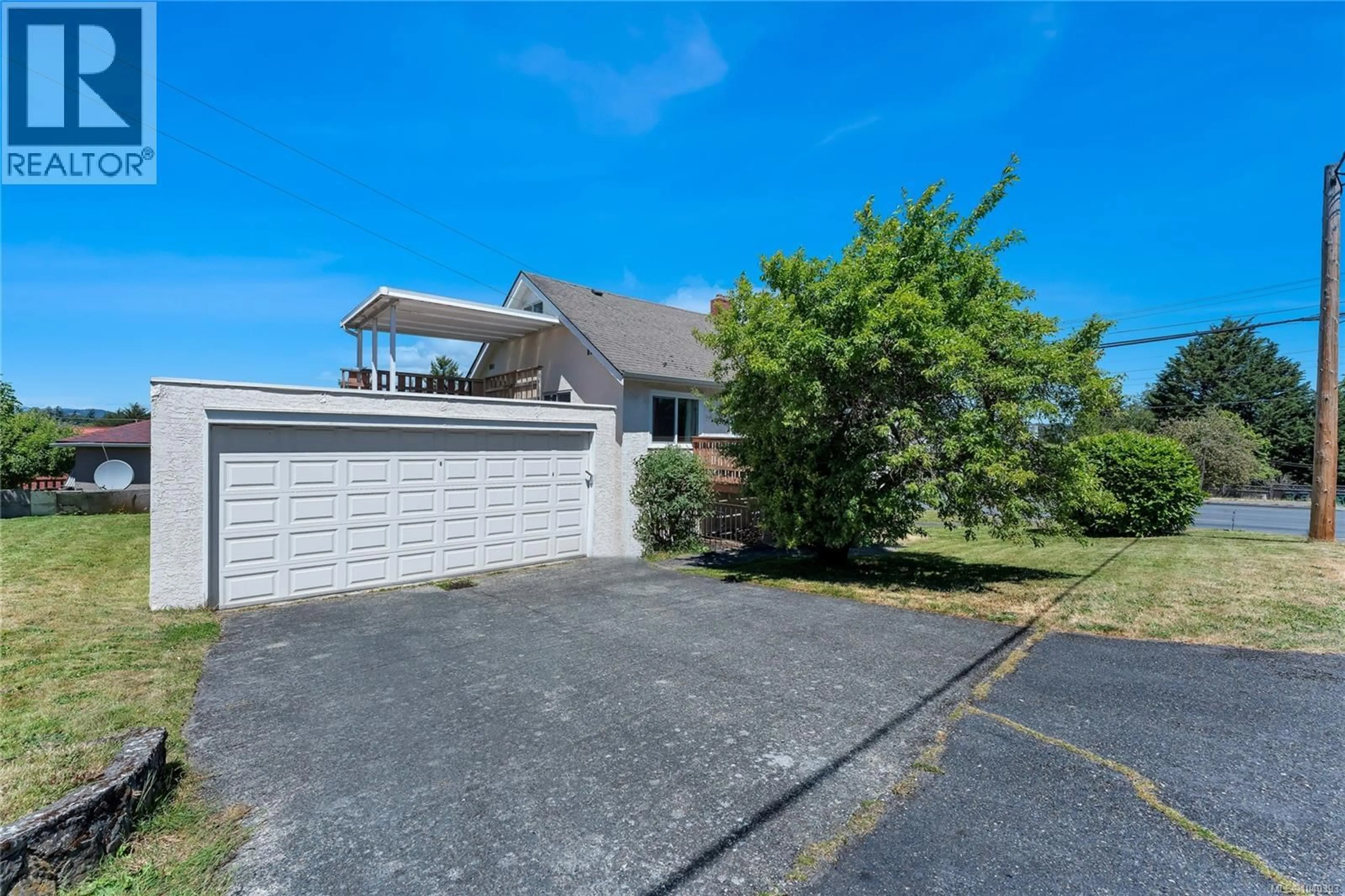 A pic from outside/outdoor area/front of a property/back of a property/a pic from drone, street for 201 BURNSIDE ROAD, Saanich British Columbia V9A1C4