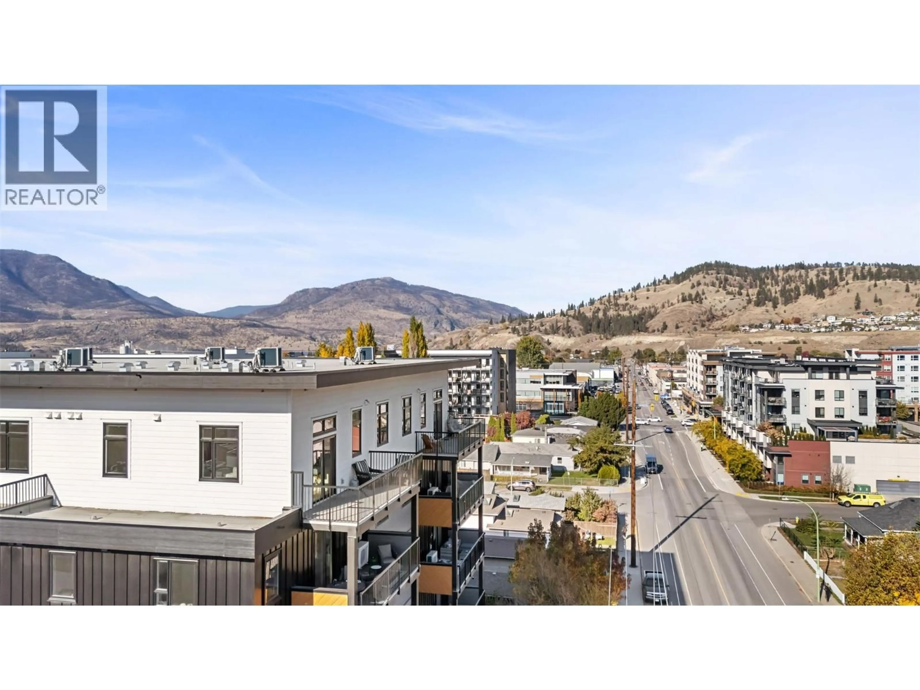 A pic from outside/outdoor area/front of a property/back of a property/a pic from drone, mountain view for 604 - 660 CAWSTON AVENUE, Kelowna British Columbia V1Y2L1
