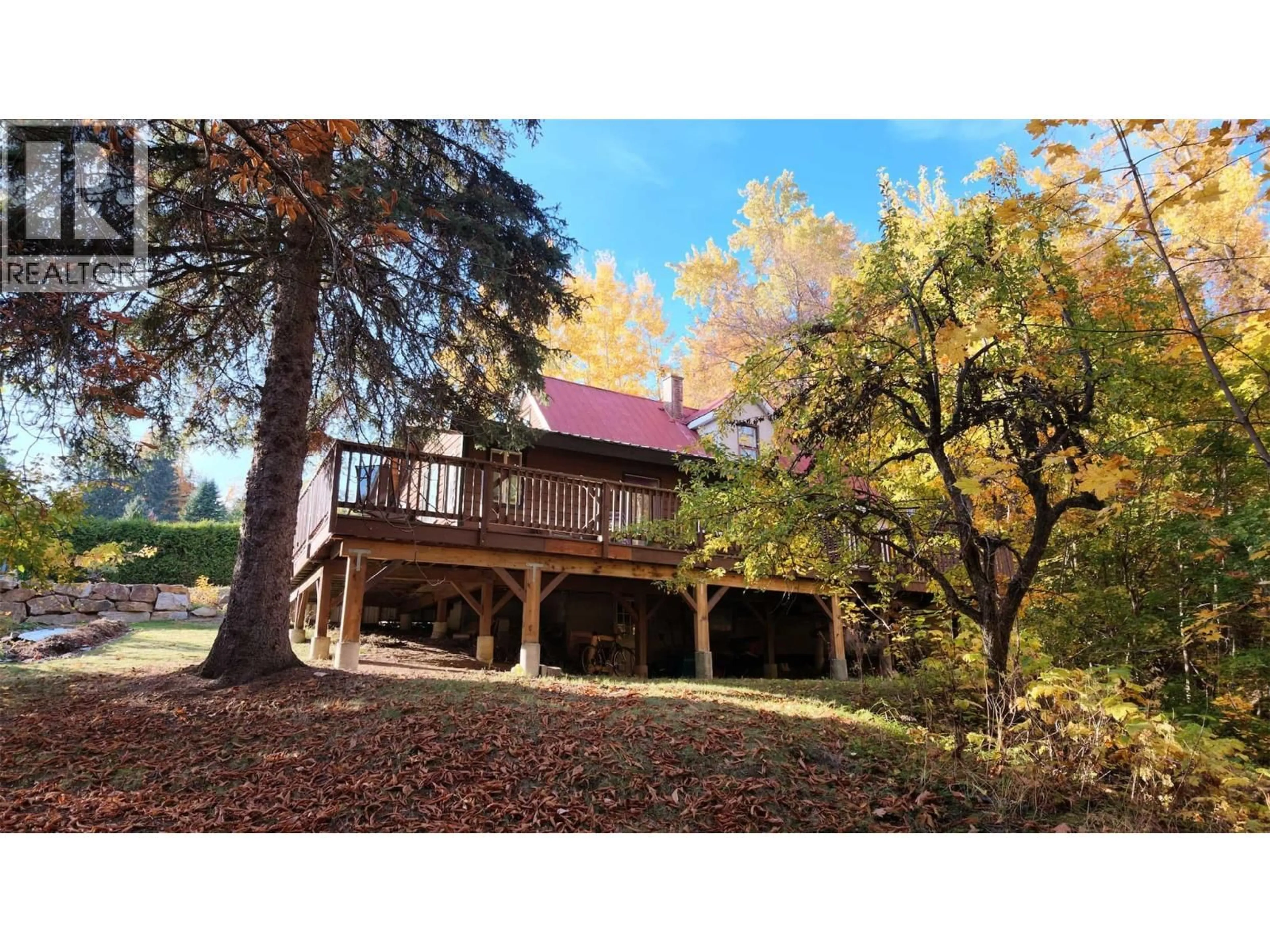 A pic from outside/outdoor area/front of a property/back of a property/a pic from drone, forest/trees view for 1380 QUEEN STREET, Rossland British Columbia V0G1Y0