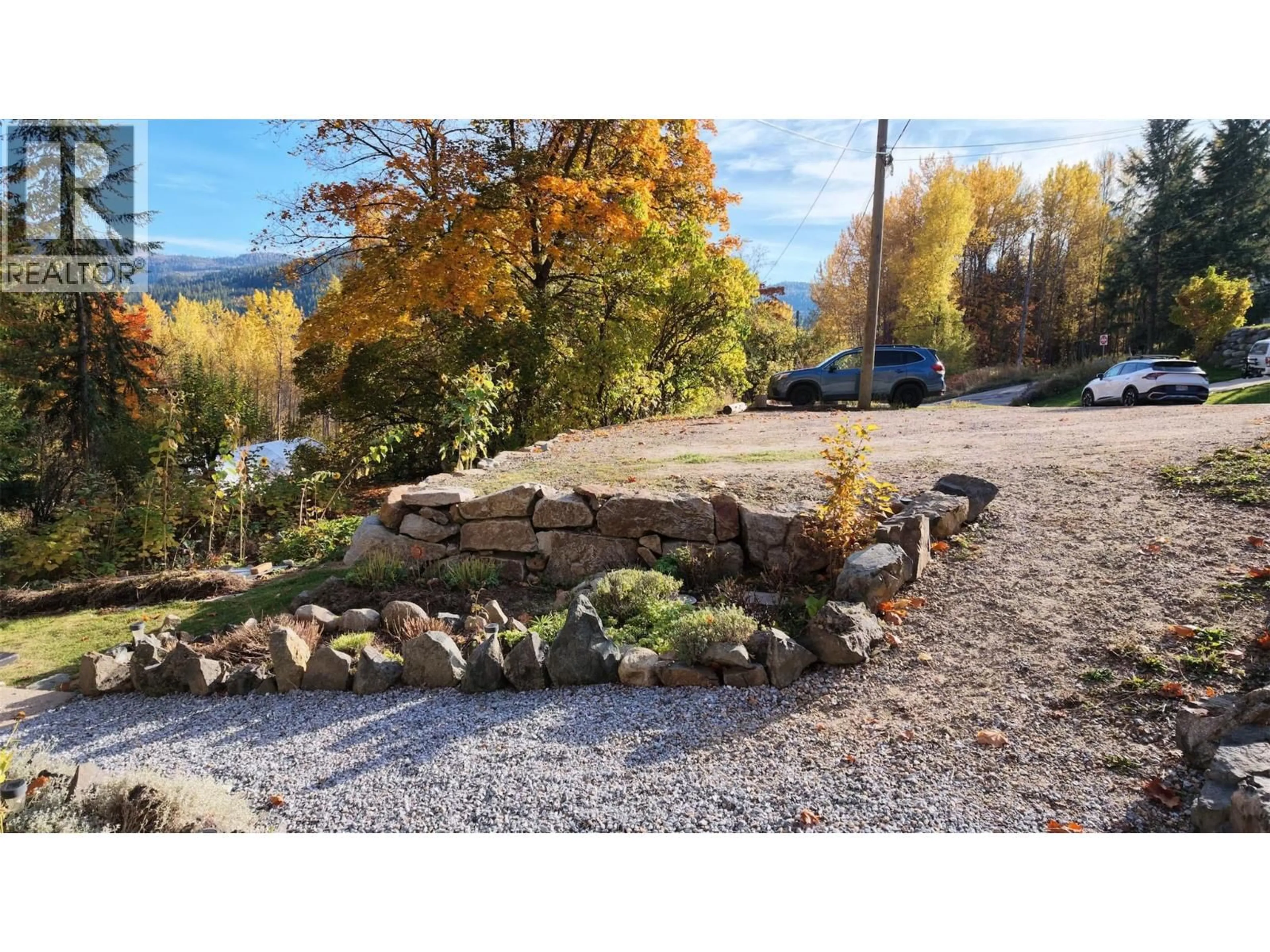 A pic from outside/outdoor area/front of a property/back of a property/a pic from drone, mountain view for 1380 QUEEN STREET, Rossland British Columbia V0G1Y0