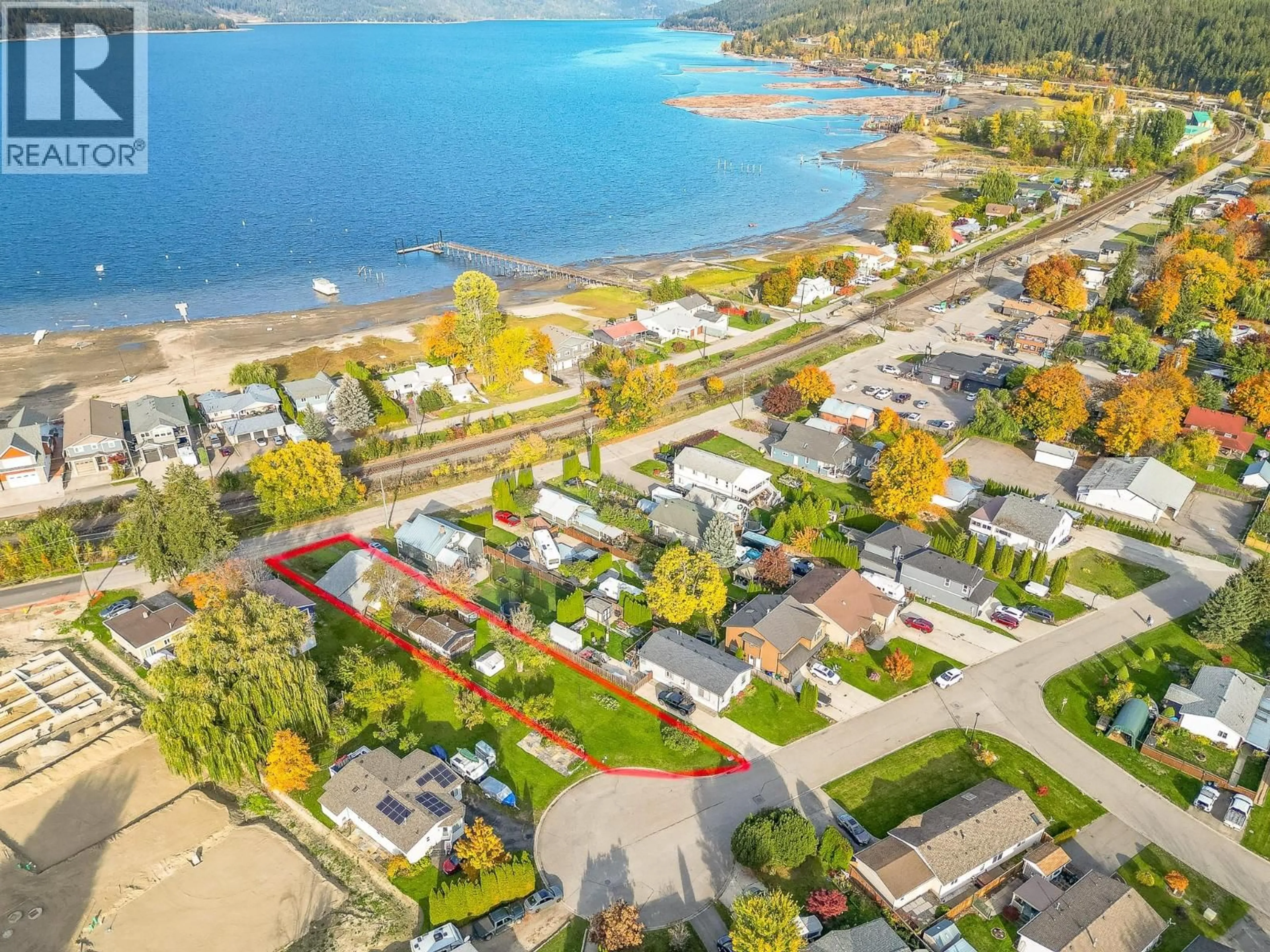 A pic from outside/outdoor area/front of a property/back of a property/a pic from drone, water/lake/river/ocean view for 4760 CANOE BEACH DRIVE DRIVE NORTHEAST, Salmon Arm British Columbia V0E1K0