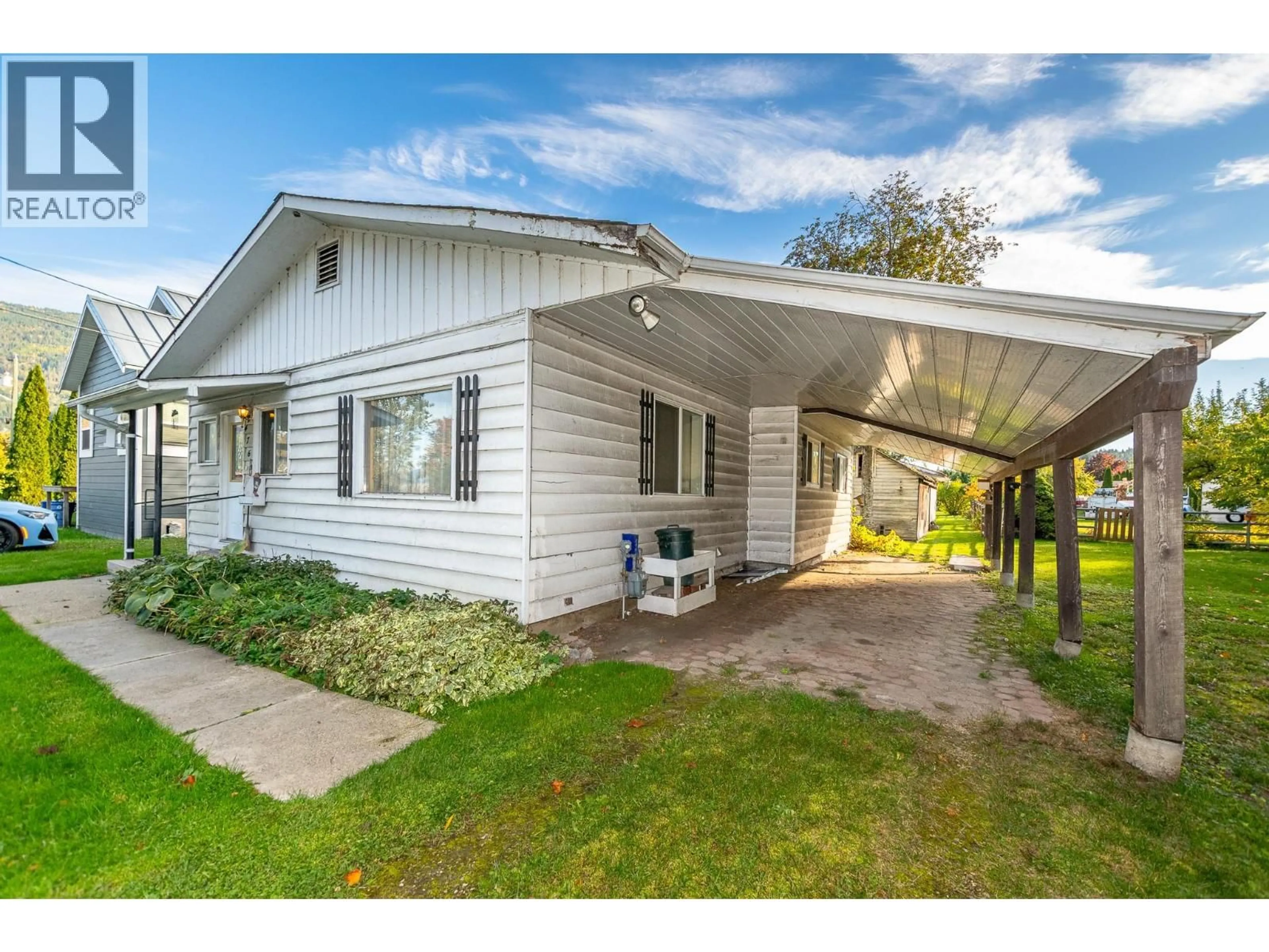 Home with vinyl exterior material, street for 4760 CANOE BEACH DRIVE DRIVE NORTHEAST, Salmon Arm British Columbia V0E1K0
