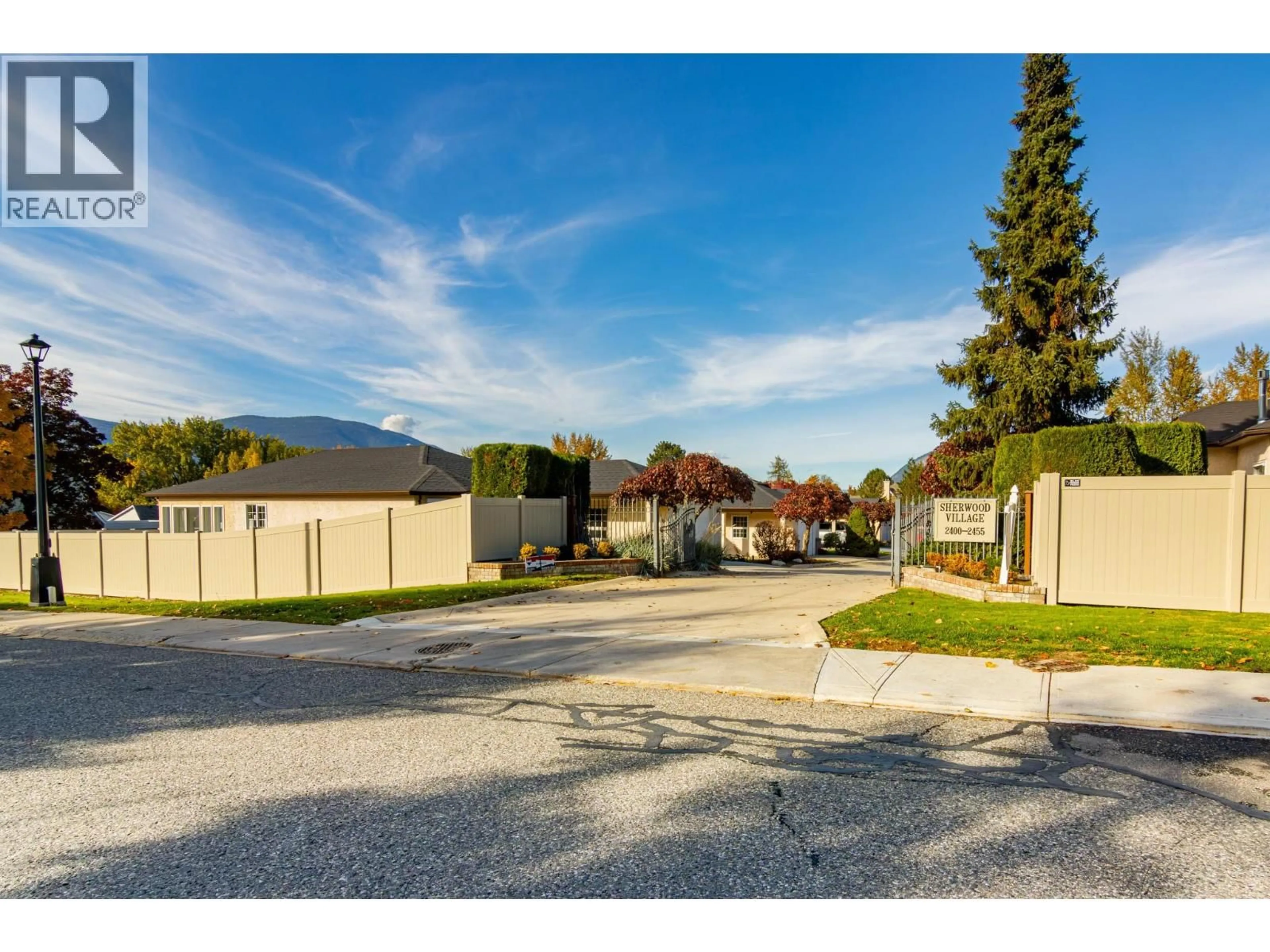 A pic from outside/outdoor area/front of a property/back of a property/a pic from drone, street for 2455 5TH AVENUE NORTHEAST, Salmon Arm British Columbia V1E1Y9