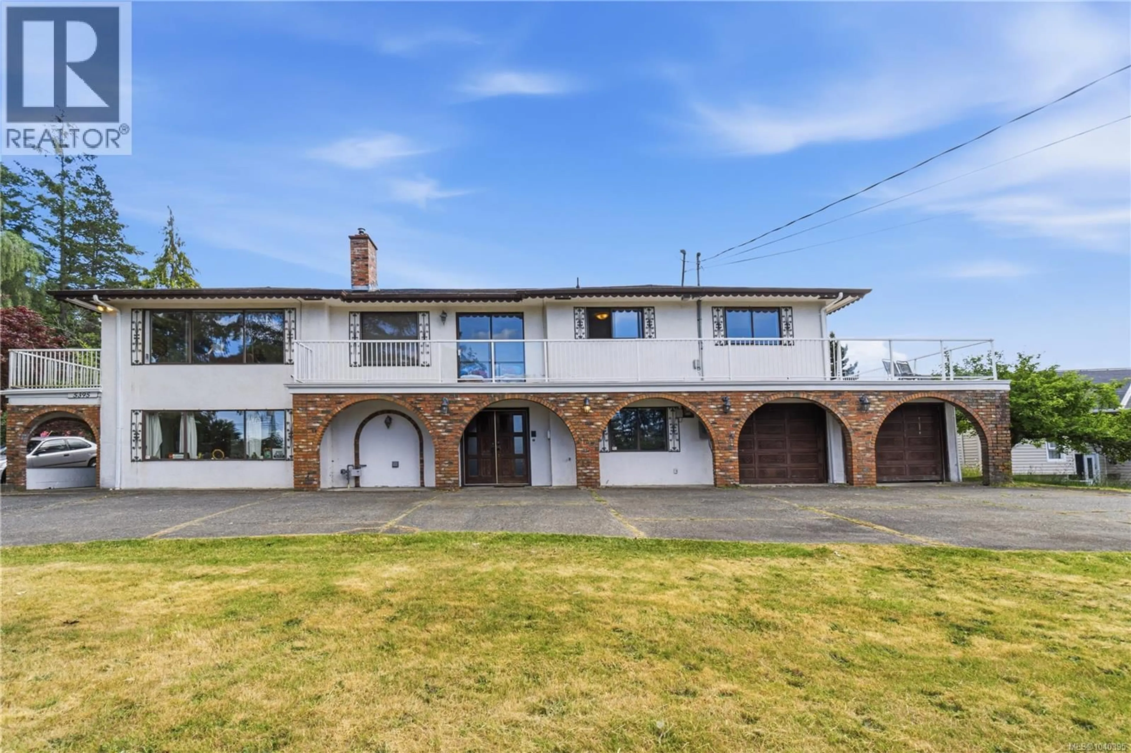 A pic from outside/outdoor area/front of a property/back of a property/a pic from drone, building for 5395 LOST LAKE ROAD, Nanaimo British Columbia V9T5E7