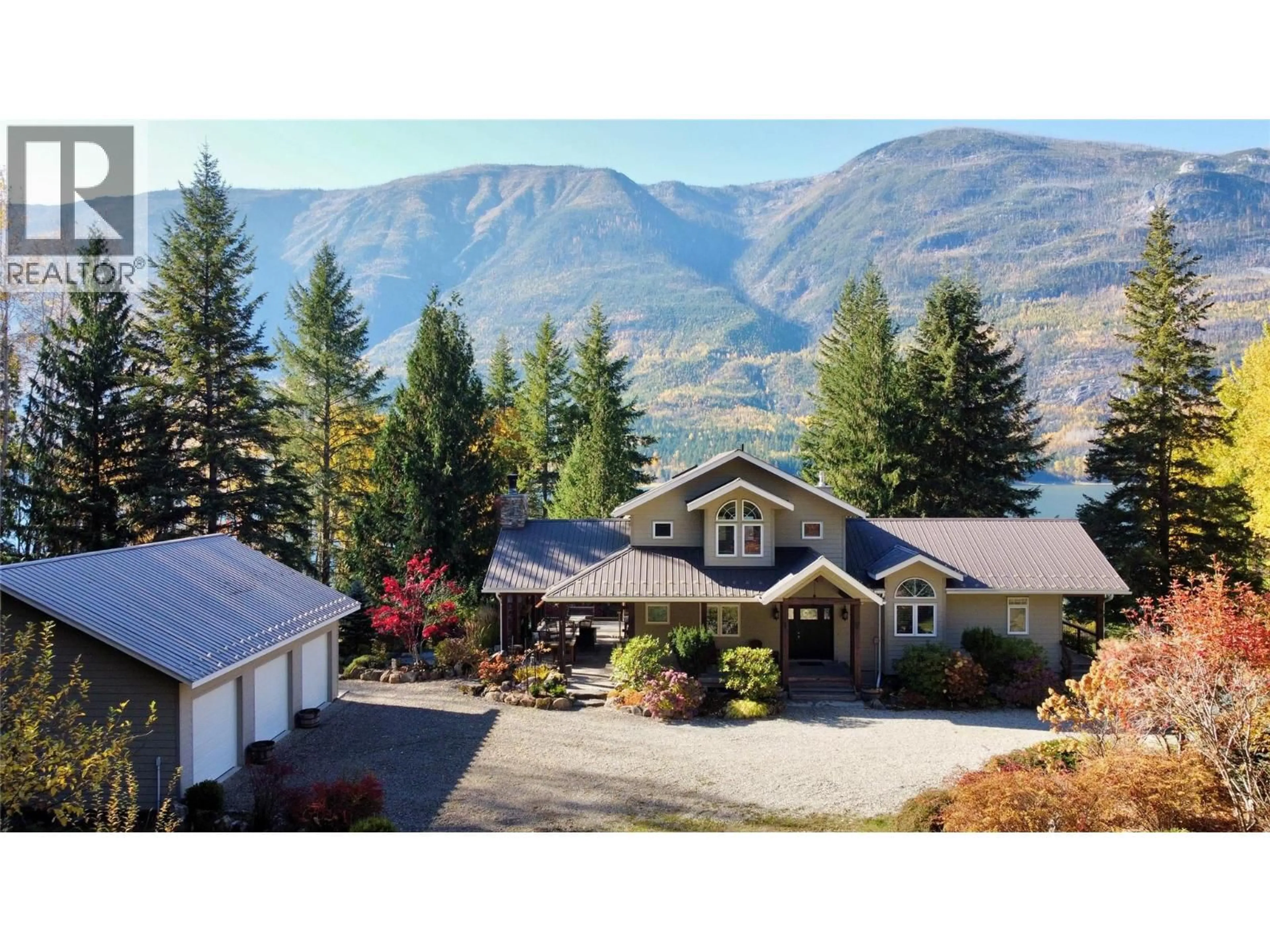 A pic from outside/outdoor area/front of a property/back of a property/a pic from drone, mountain view for 4962 HIGHWAY 6 HIGHWAY, Burton British Columbia V0G1R0