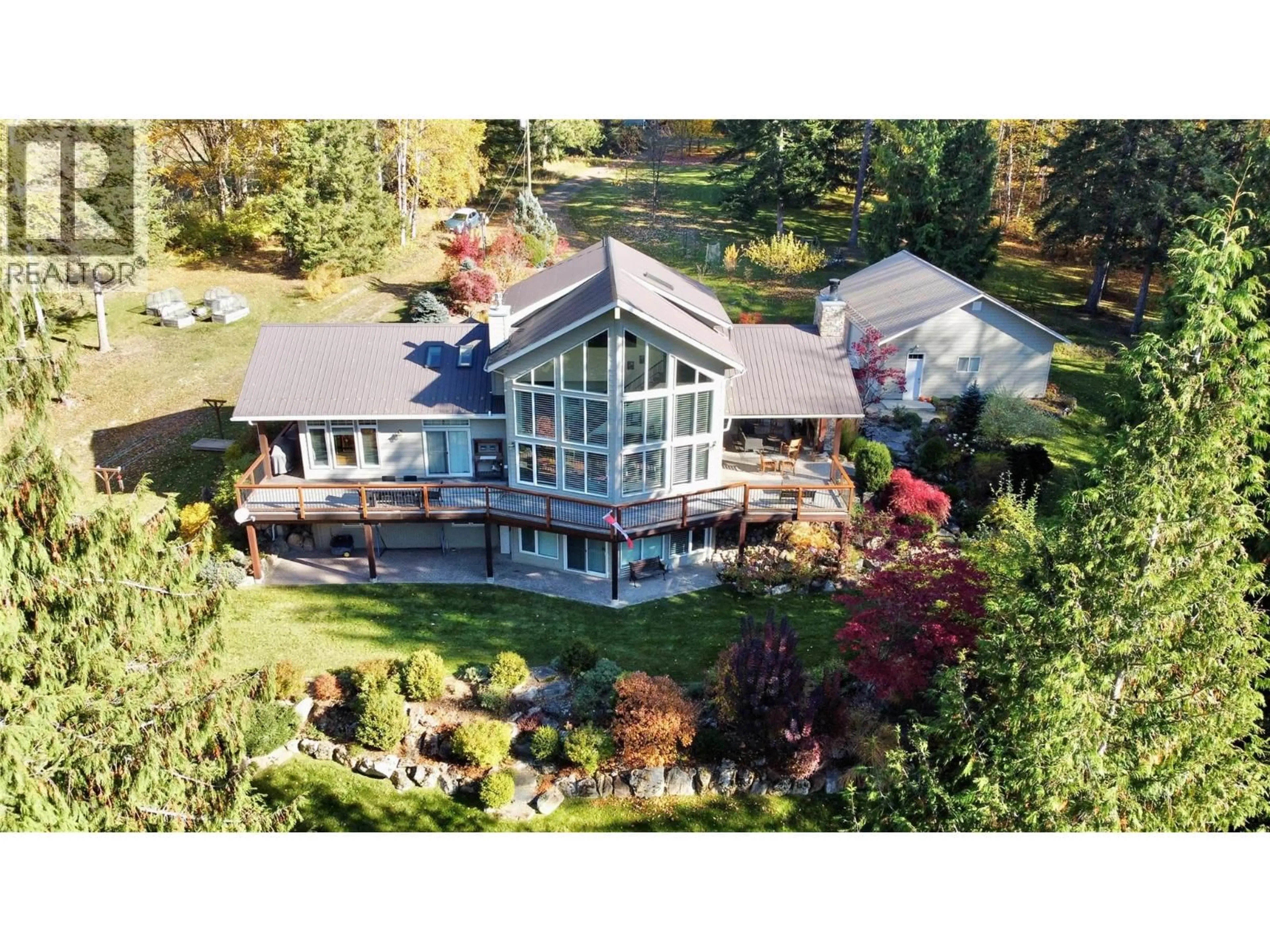 A pic from outside/outdoor area/front of a property/back of a property/a pic from drone, water/lake/river/ocean view for 4962 HIGHWAY 6 HIGHWAY, Burton British Columbia V0G1R0