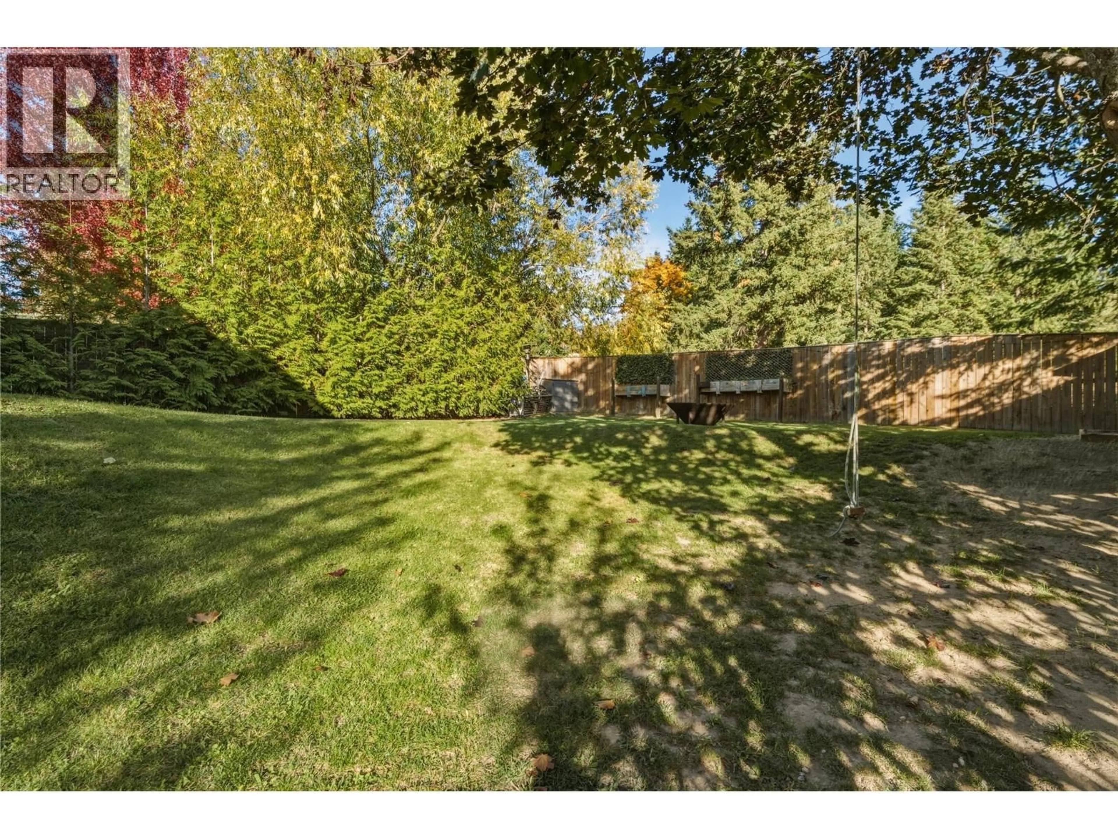 A pic from outside/outdoor area/front of a property/back of a property/a pic from drone, forest/trees view for 2810 25 STREET NORTHEAST, Salmon Arm British Columbia V1E0G2
