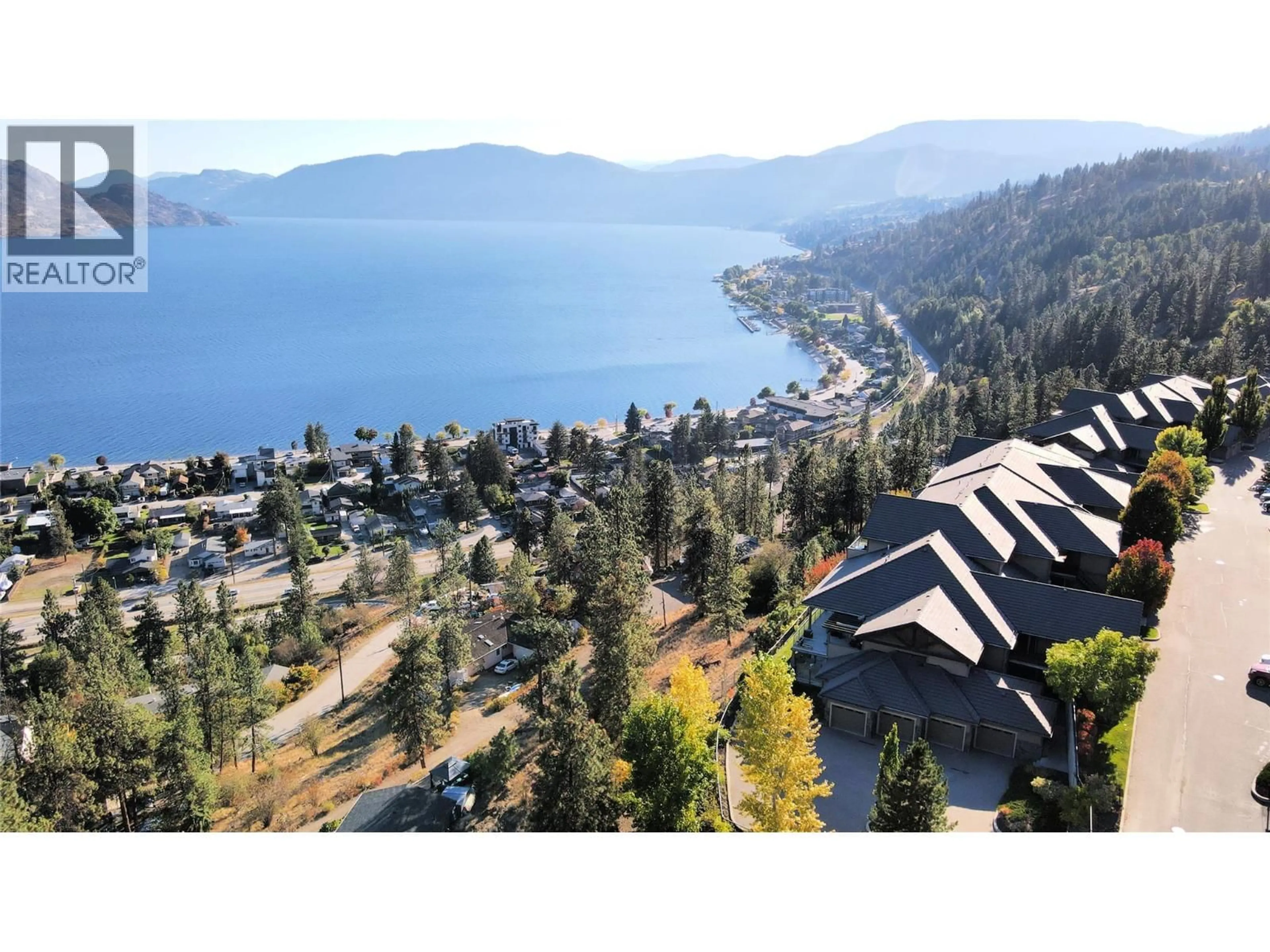 A pic from outside/outdoor area/front of a property/back of a property/a pic from drone, water/lake/river/ocean view for 129 - 4350 PONDEROSA DRIVE, Peachland British Columbia V0H1X5