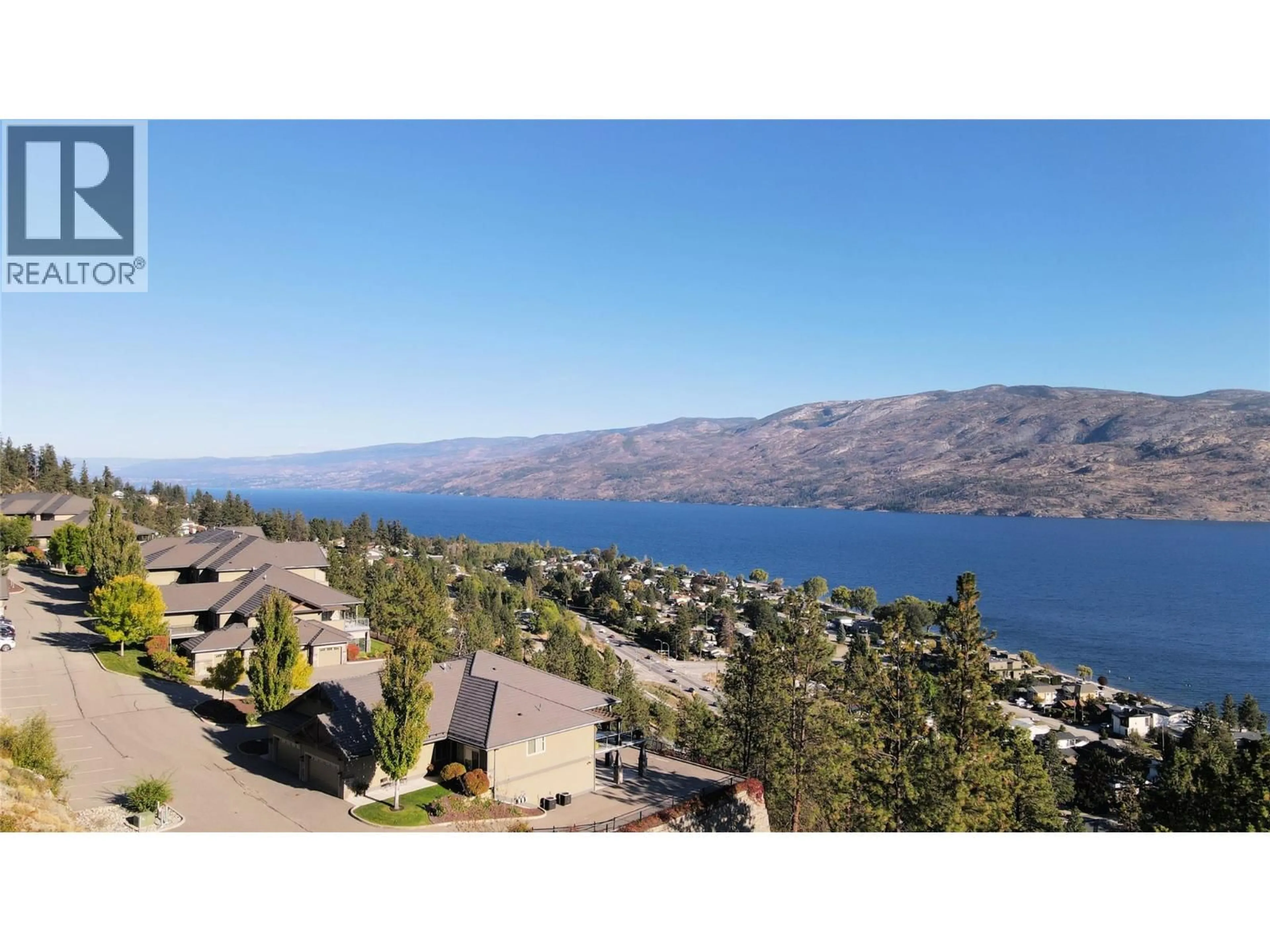 A pic from outside/outdoor area/front of a property/back of a property/a pic from drone, water/lake/river/ocean view for 129 - 4350 PONDEROSA DRIVE, Peachland British Columbia V0H1X5