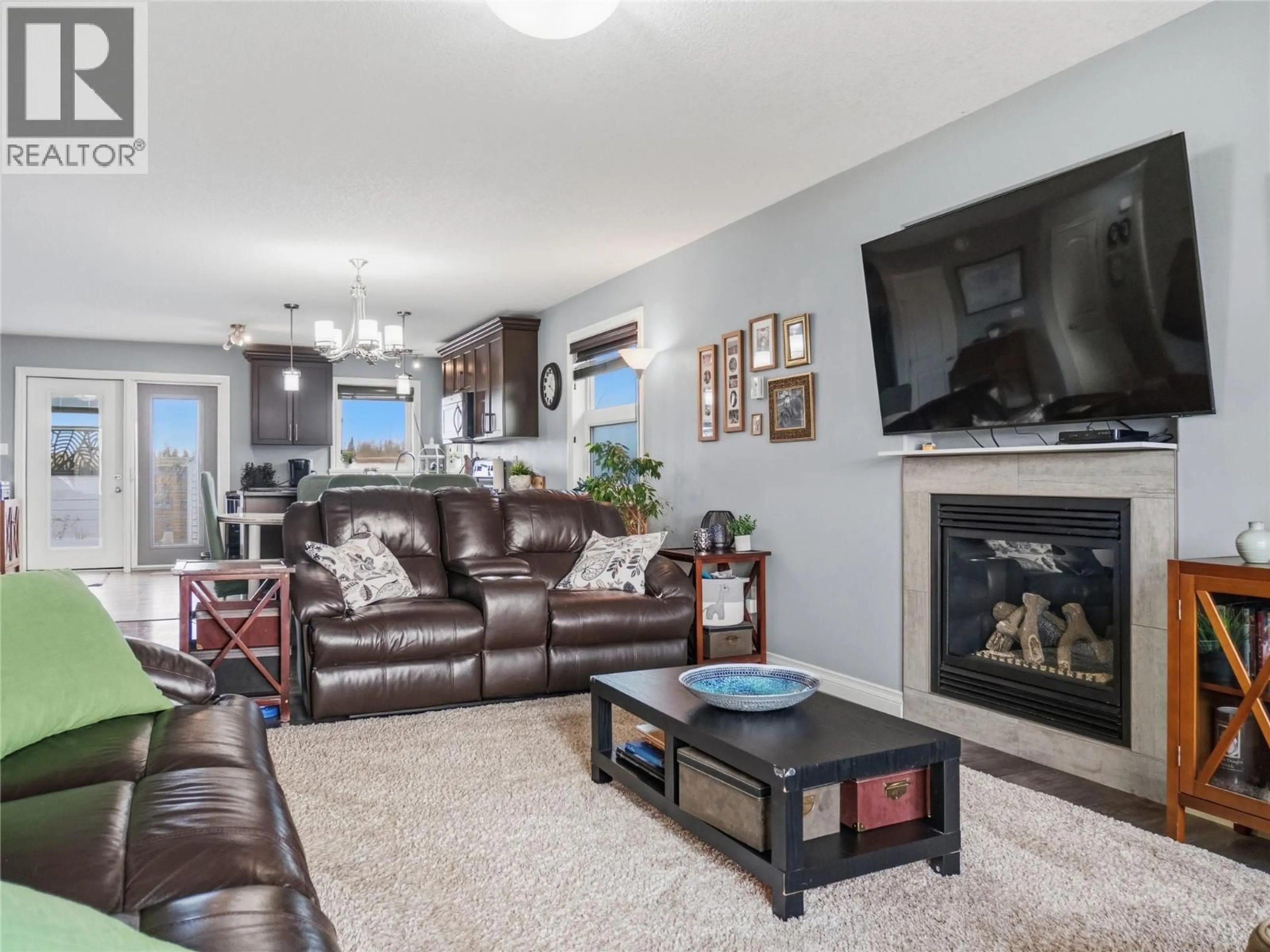 Living room with furniture, unknown for 912 88 AVENUE, Dawson Creek British Columbia V1G0C9