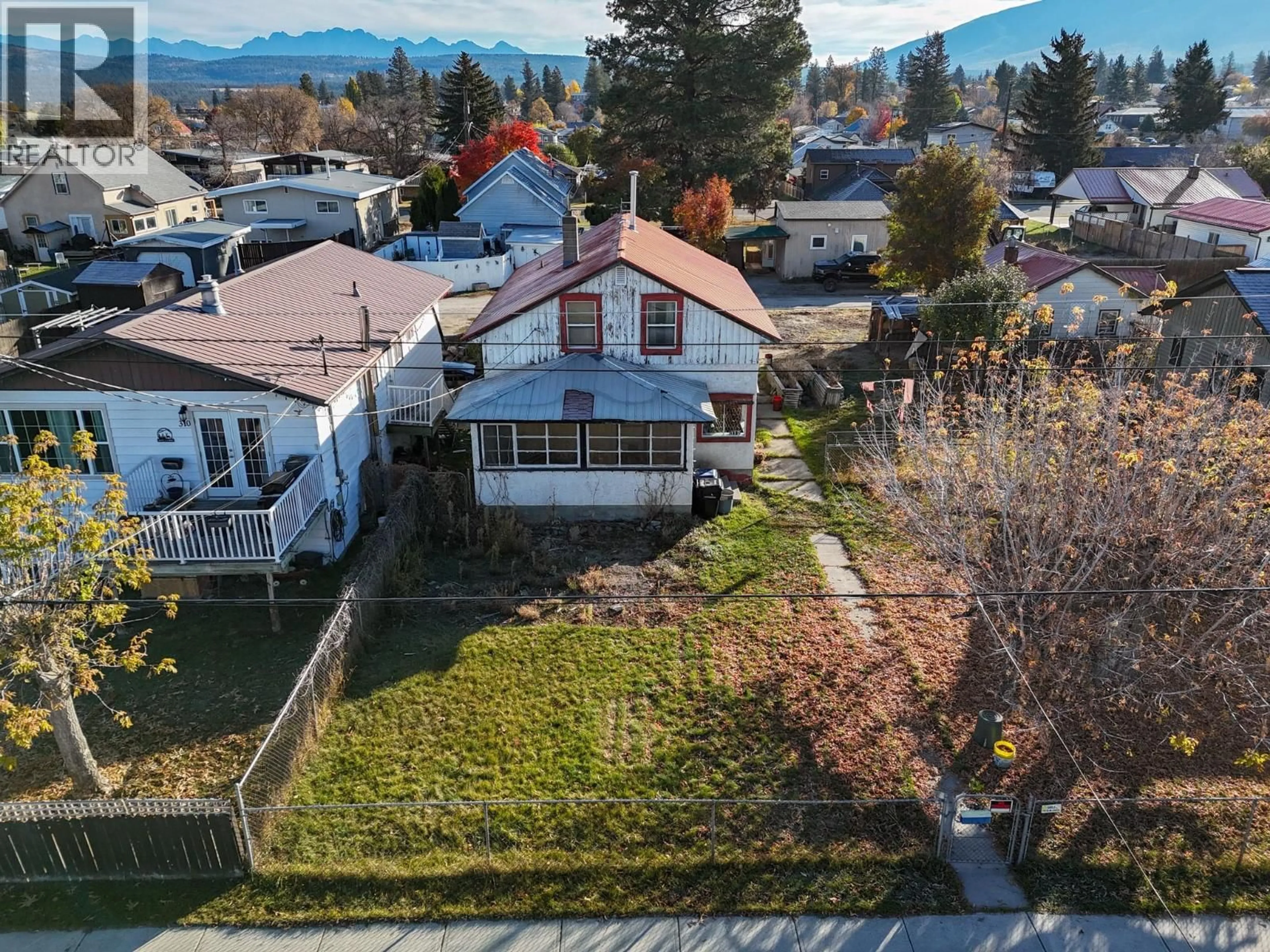 A pic from outside/outdoor area/front of a property/back of a property/a pic from drone, mountain view for 312 3RD AVENUE SOUTH, Cranbrook British Columbia V1C2B9