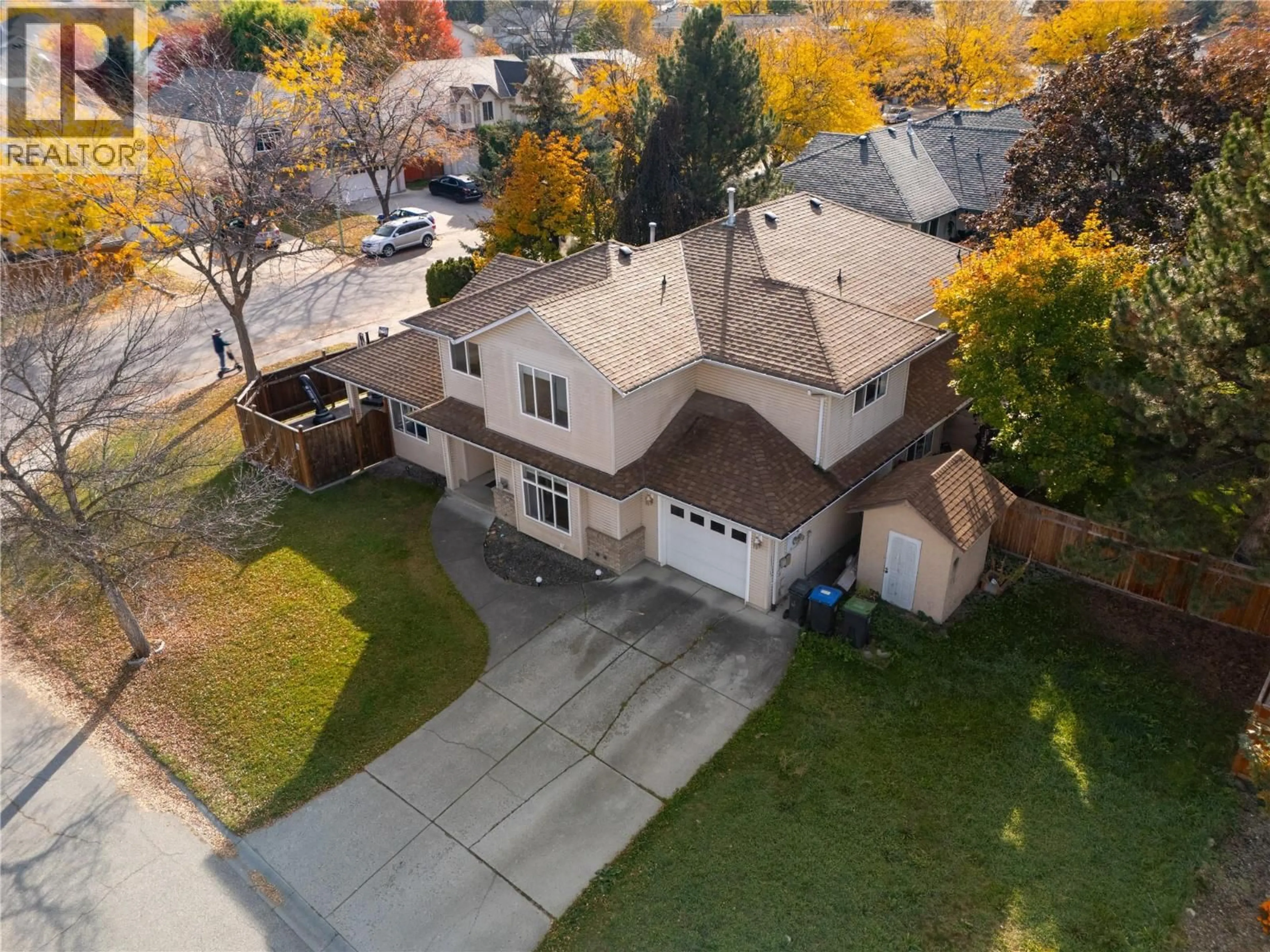 A pic from outside/outdoor area/front of a property/back of a property/a pic from drone, street for 415 KLASSEN ROAD, Kelowna British Columbia V1X7P2