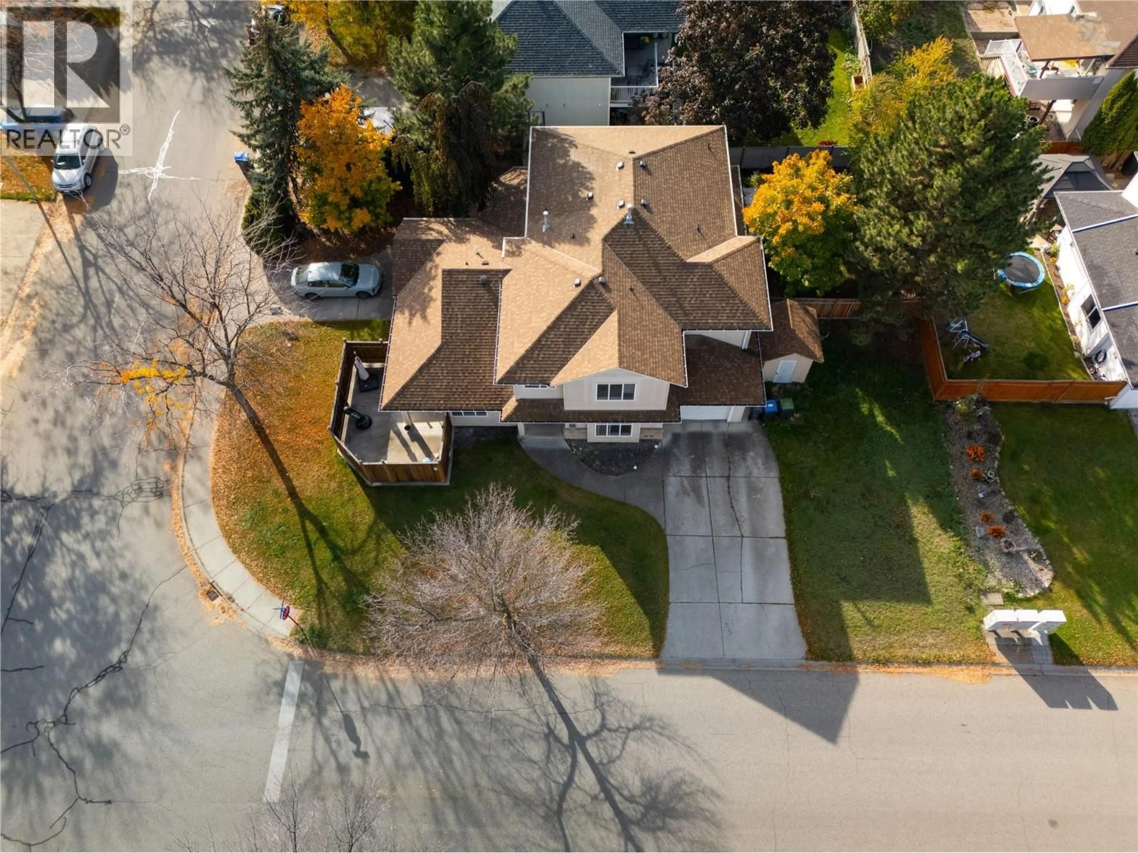 A pic from outside/outdoor area/front of a property/back of a property/a pic from drone, street for 415 KLASSEN ROAD, Kelowna British Columbia V1X7P2