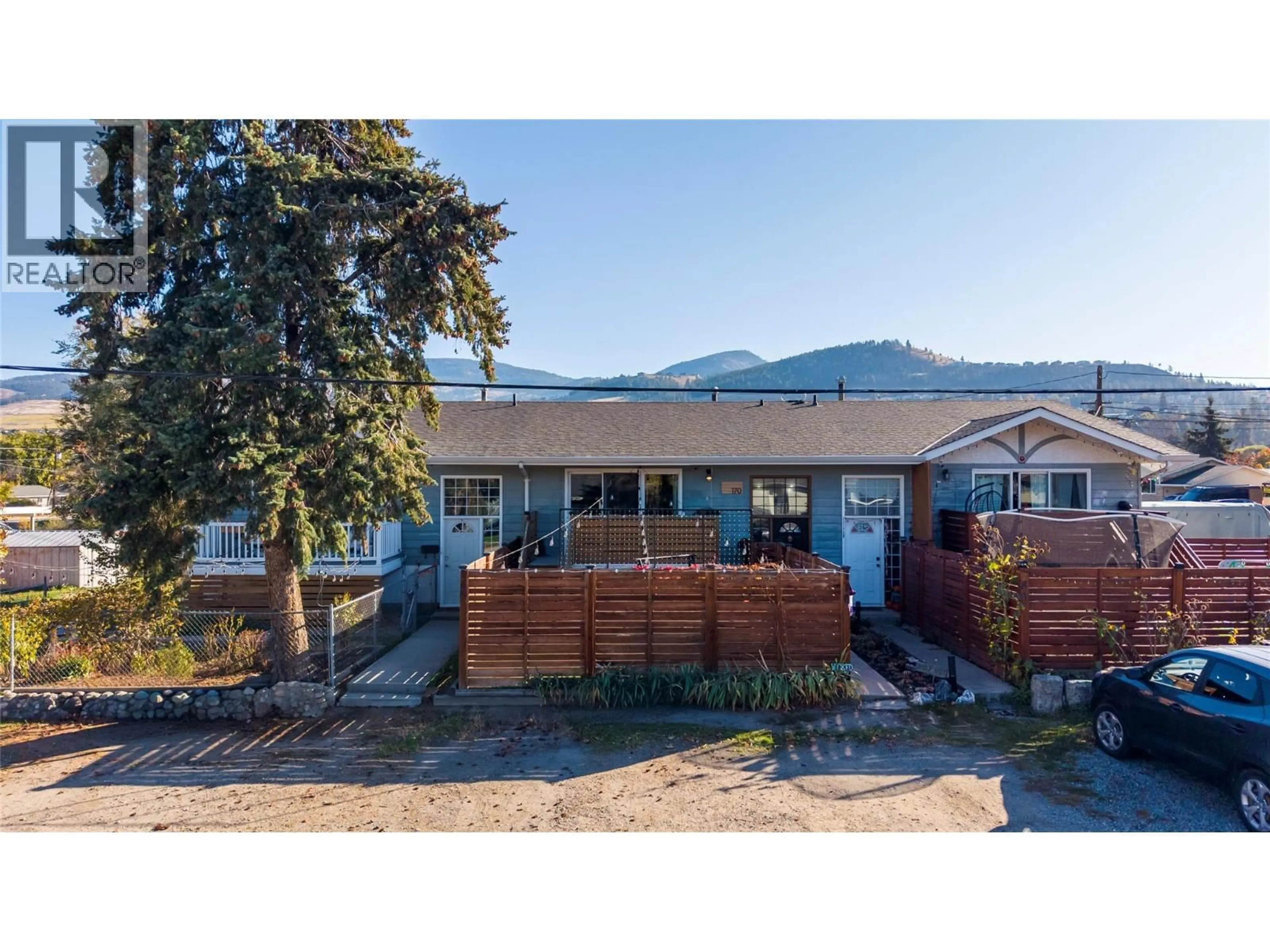 A pic from outside/outdoor area/front of a property/back of a property/a pic from drone, mountain view for 170 SCARBORO ROAD, Kelowna British Columbia V1X1M2