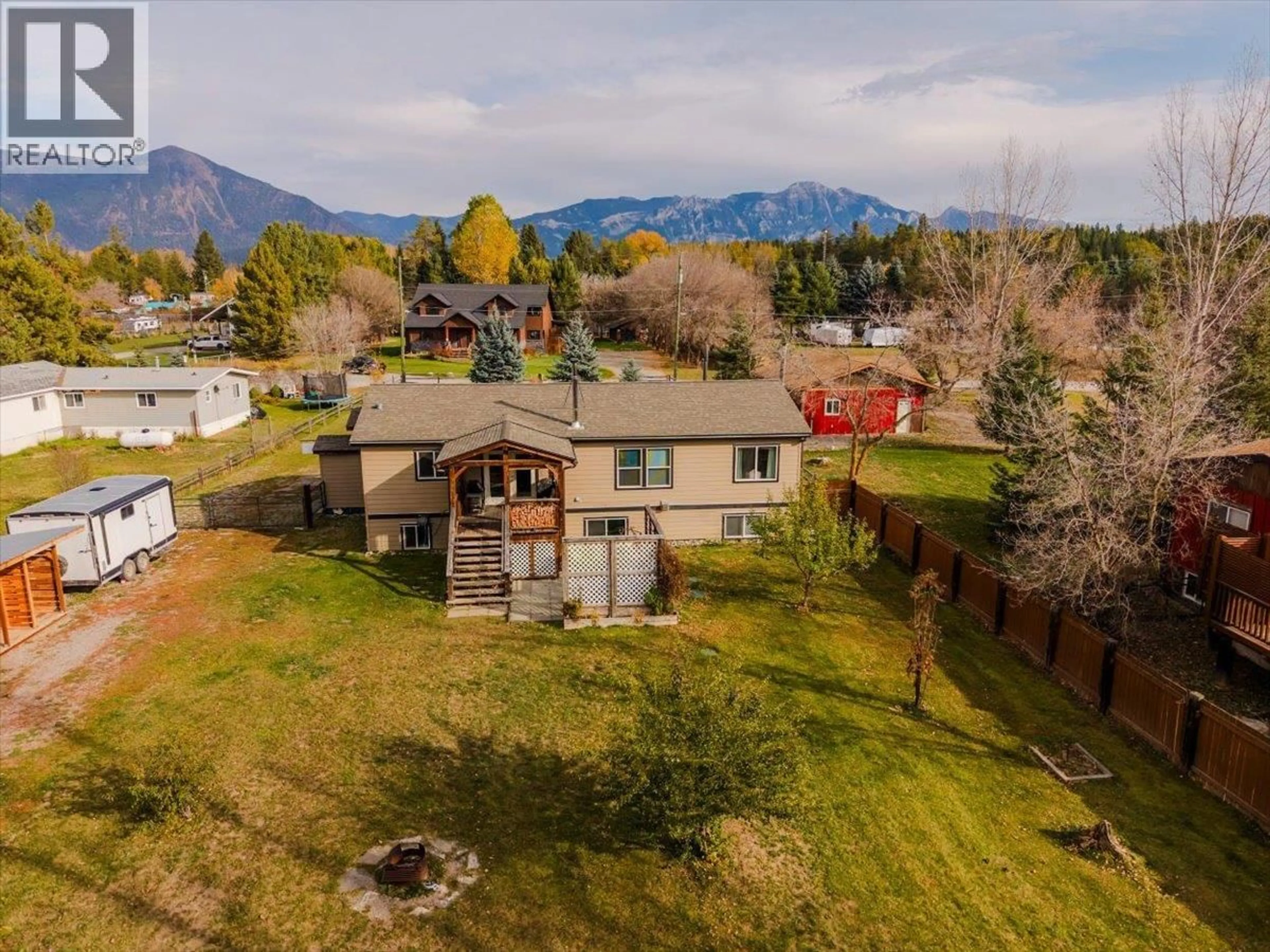 A pic from outside/outdoor area/front of a property/back of a property/a pic from drone, mountain view for 7321 GEORGE ROAD, Jaffray British Columbia V0B1T0
