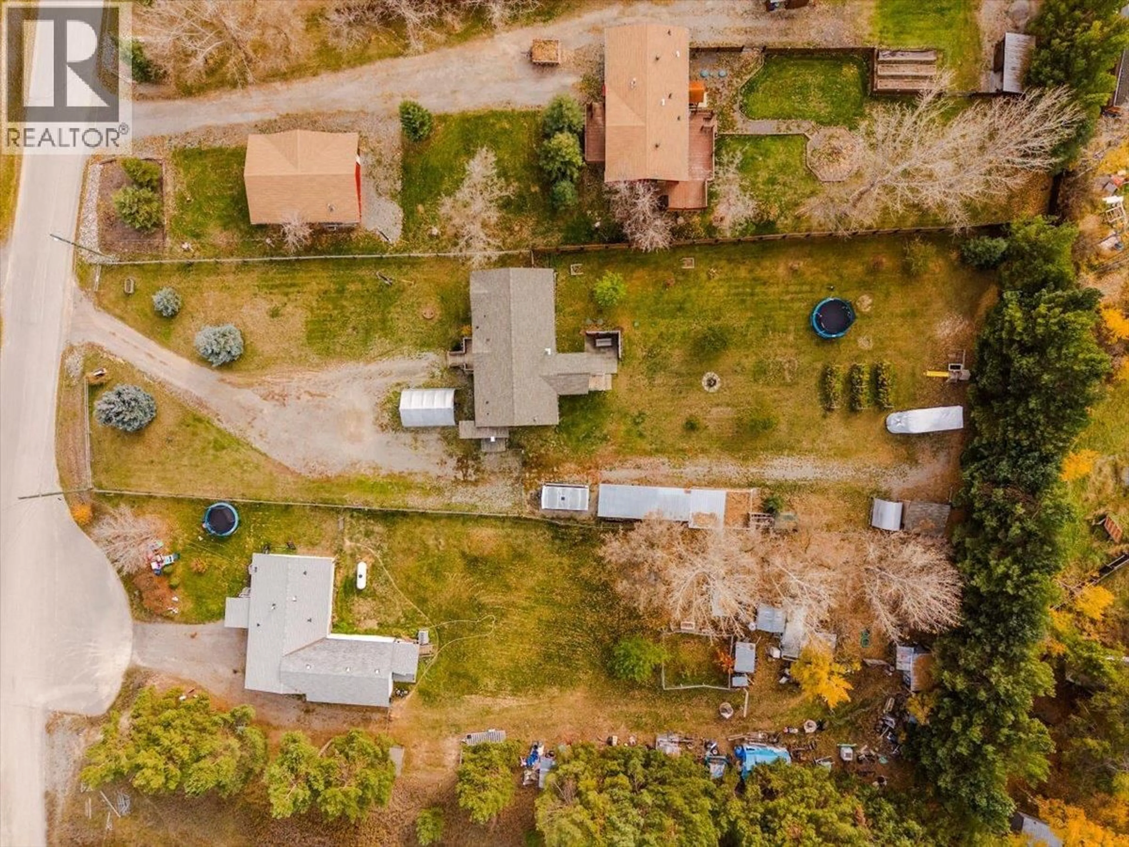 A pic from outside/outdoor area/front of a property/back of a property/a pic from drone, street for 7321 GEORGE ROAD, Jaffray British Columbia V0B1T0