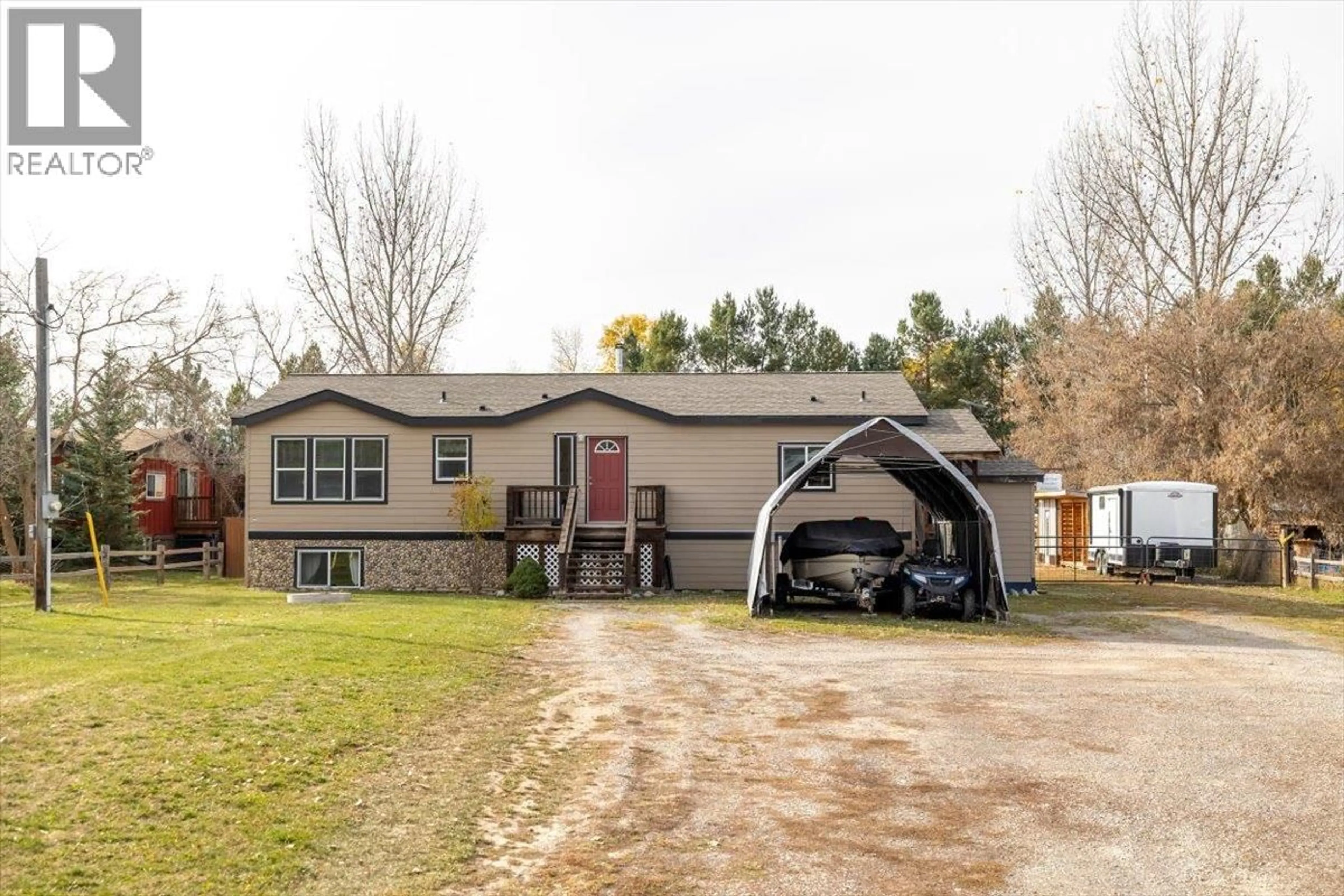 Home with vinyl exterior material, street for 7321 GEORGE ROAD, Jaffray British Columbia V0B1T0