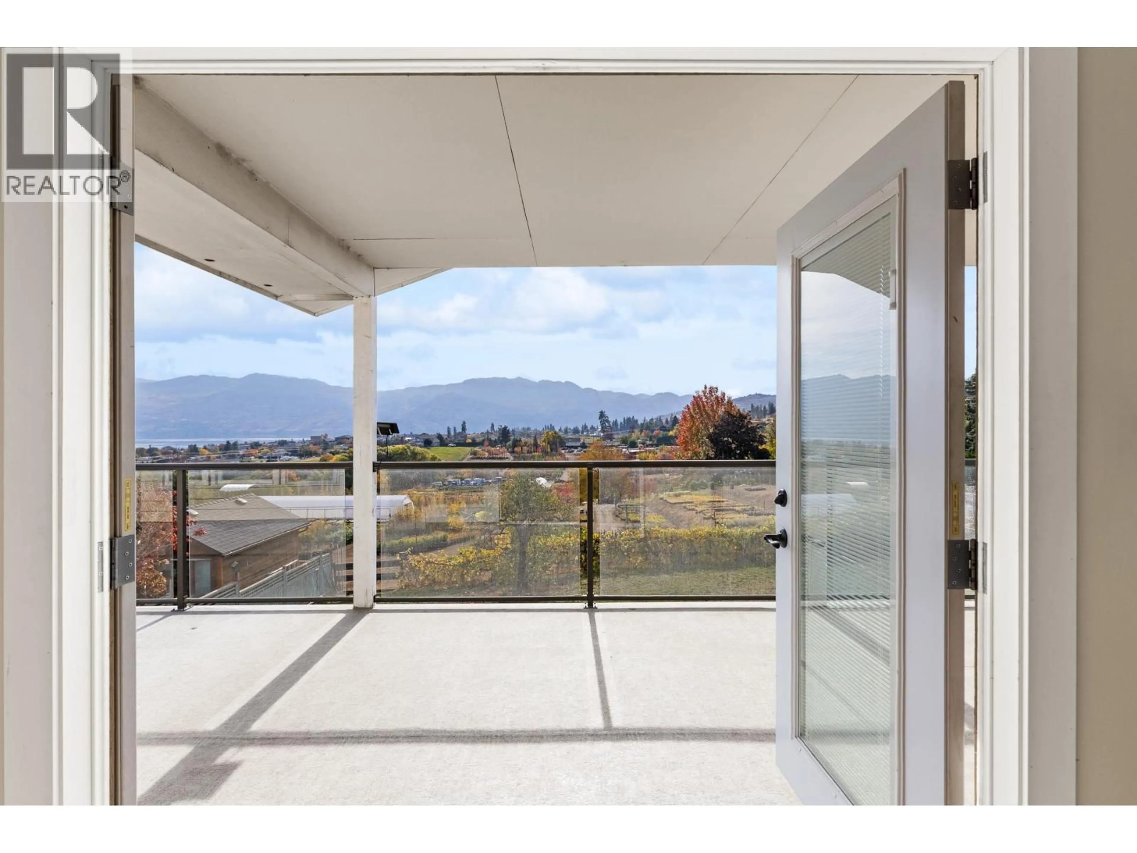Indoor foyer for 2582 NEUFELD CRESCENT, West Kelowna British Columbia V4T1P2