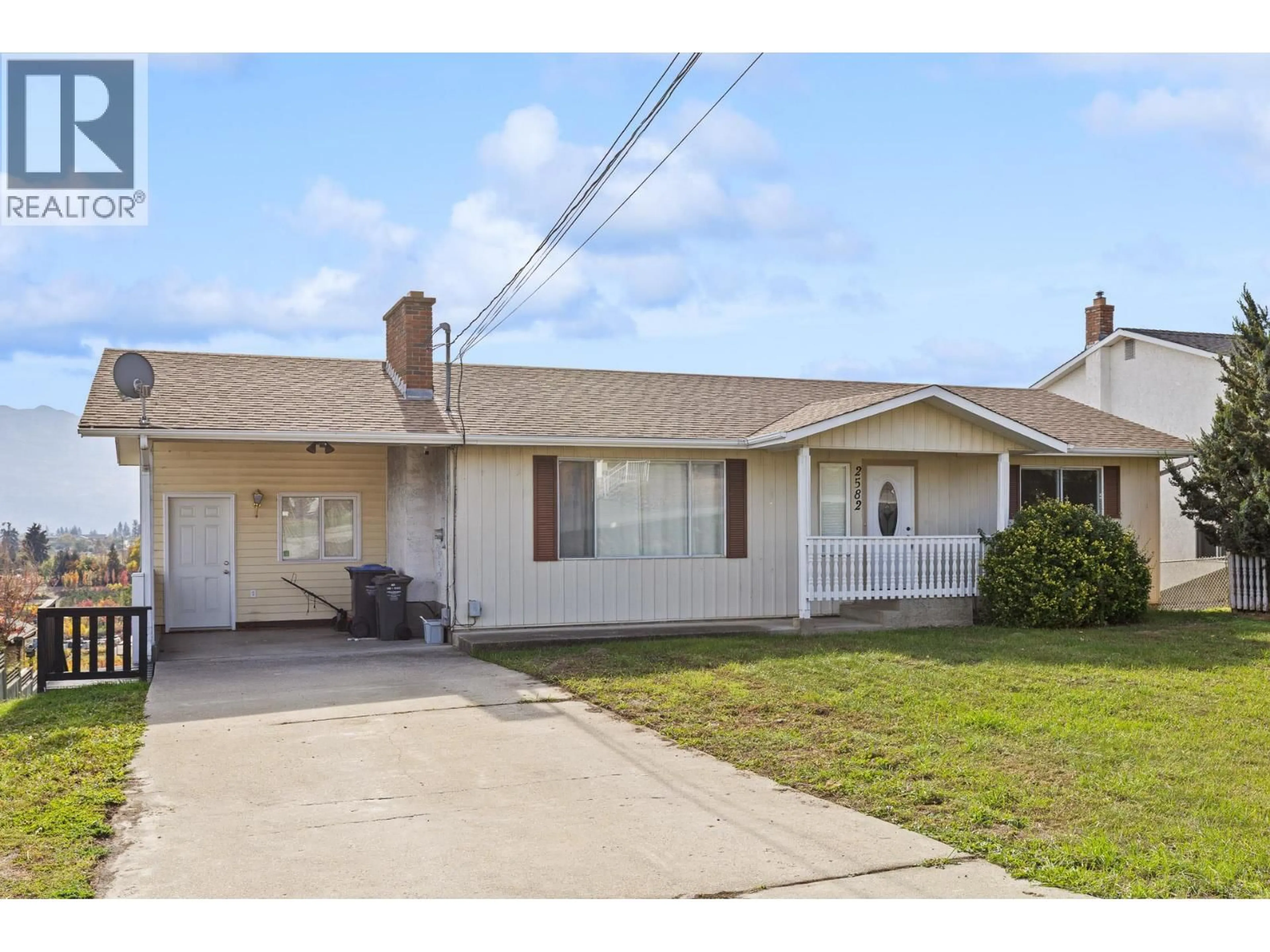 Home with vinyl exterior material, street for 2582 NEUFELD CRESCENT, West Kelowna British Columbia V4T1P2