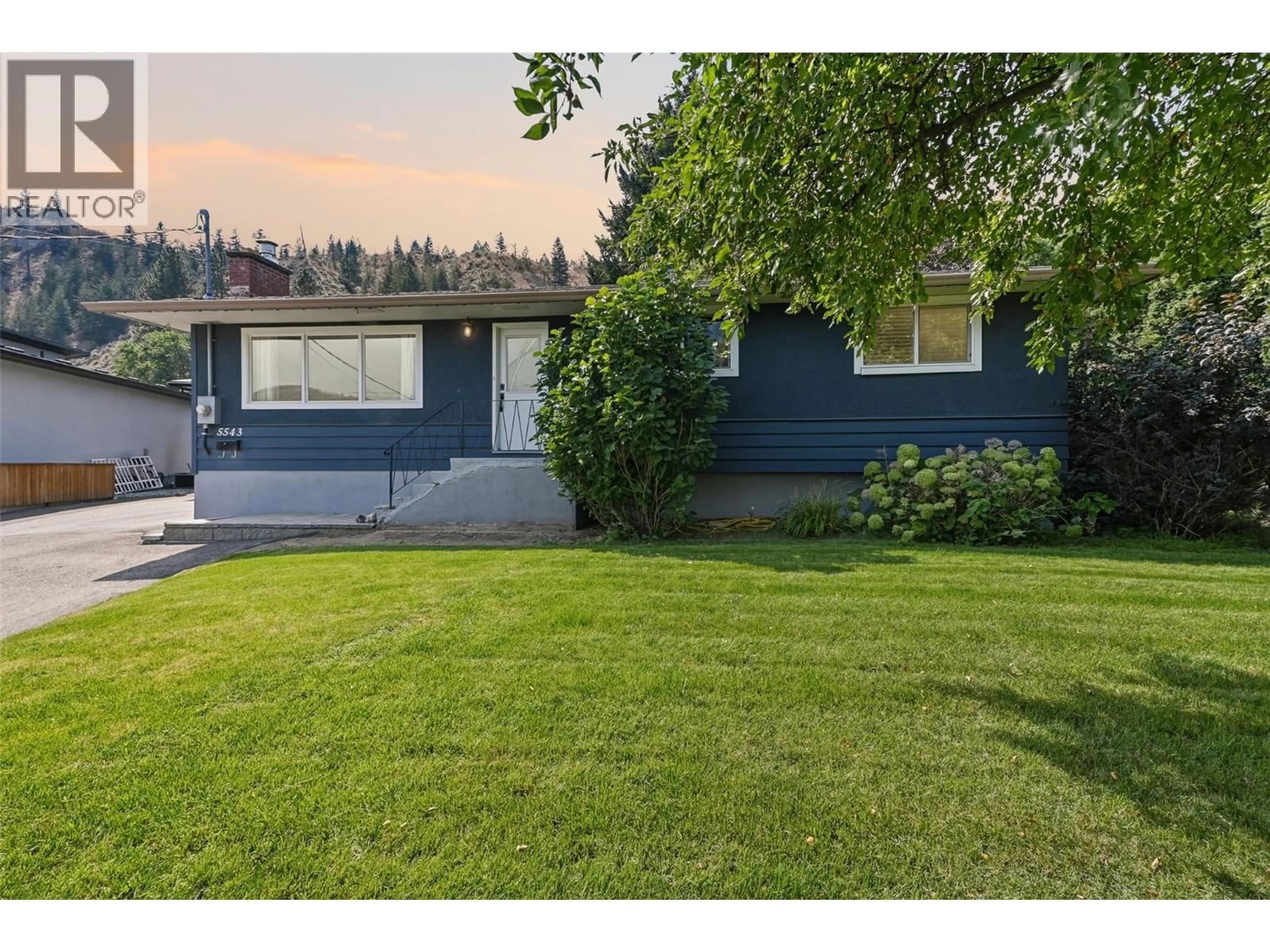 A pic from outside/outdoor area/front of a property/back of a property/a pic from drone, street for 5543 DALLAS DRIVE, Kamloops British Columbia V2C4W9