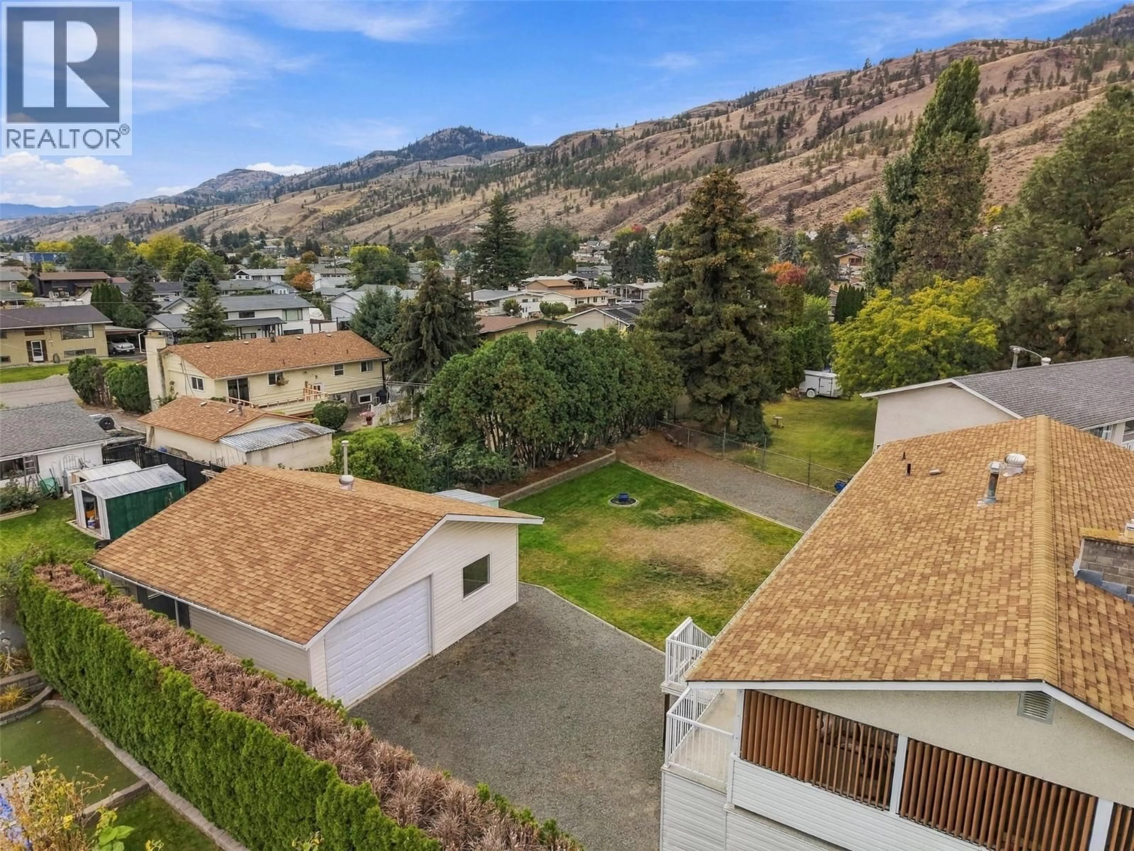 A pic from outside/outdoor area/front of a property/back of a property/a pic from drone, mountain view for 851 SUMAC PLACE, Kamloops British Columbia V2B6R4