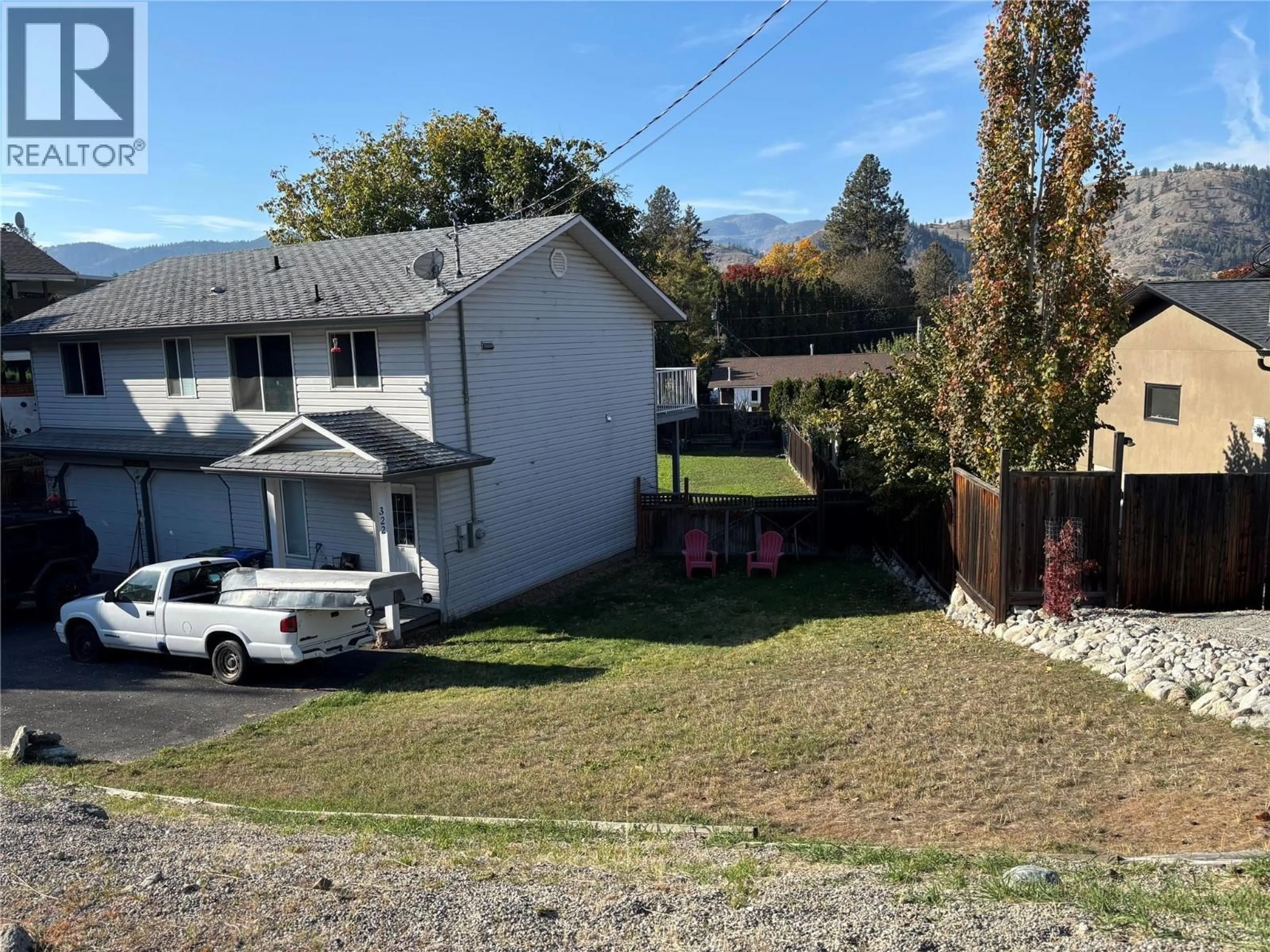 A pic from outside/outdoor area/front of a property/back of a property/a pic from drone, mountain view for 322 CARMEL CRESCENT, Okanagan Falls British Columbia V0H1R5