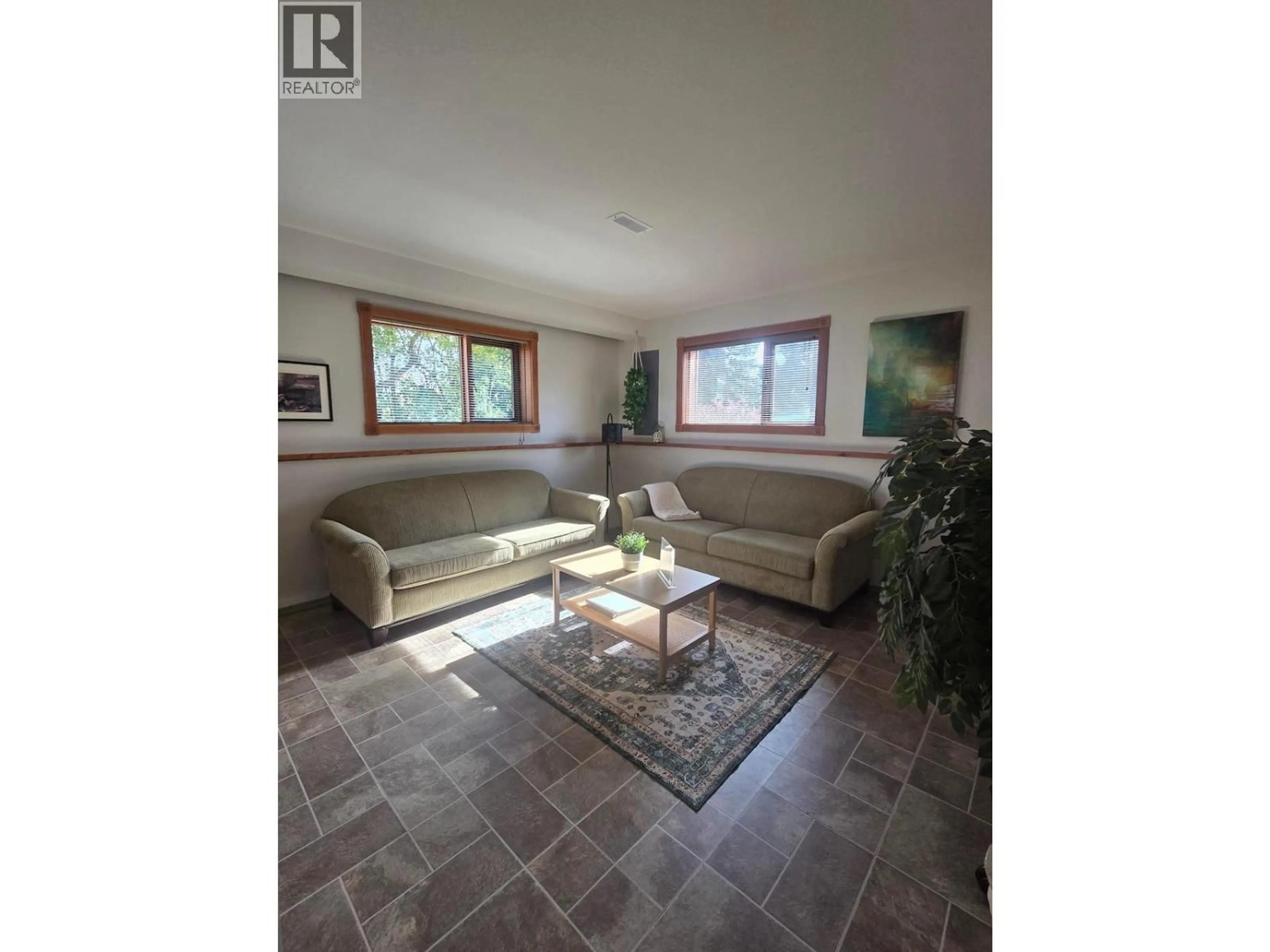 Living room with furniture, ceramic/tile floor for 3486 DAVY ROAD, Grand Forks British Columbia V0H1H2