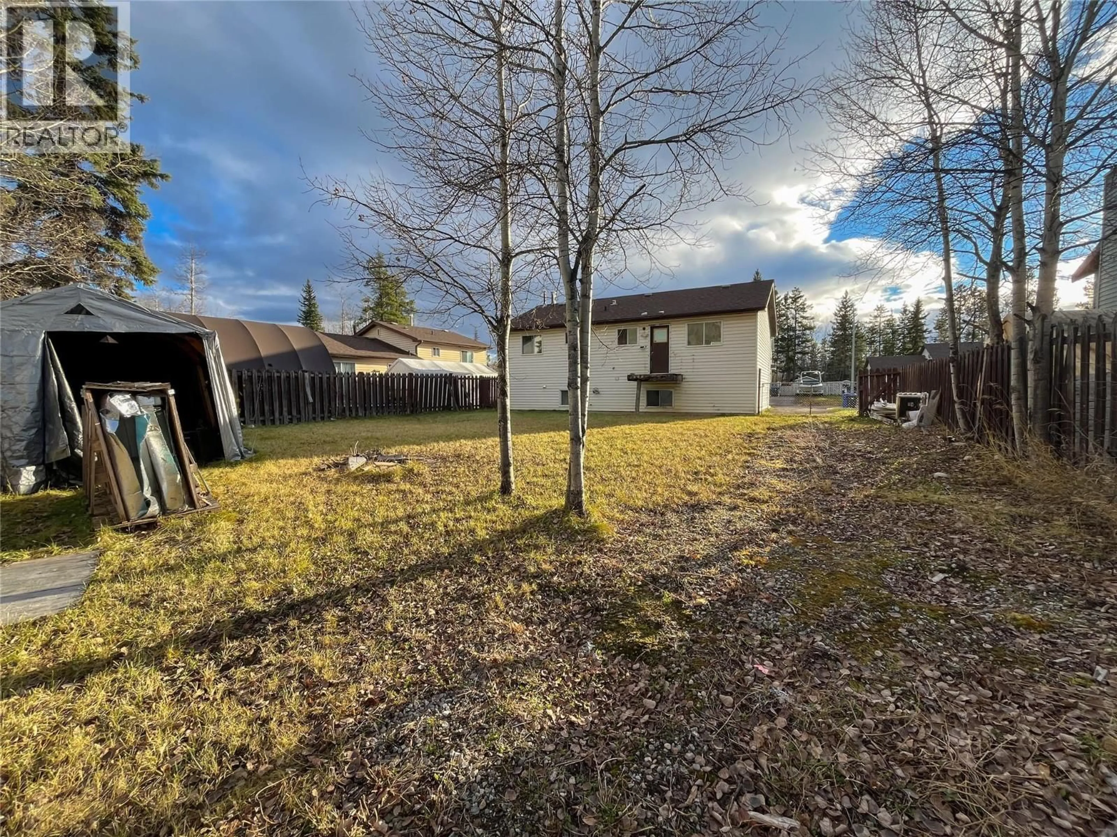 A pic from outside/outdoor area/front of a property/back of a property/a pic from drone, forest/trees view for 36 KISKATINAW PLACE, Tumbler Ridge British Columbia V0C2W0