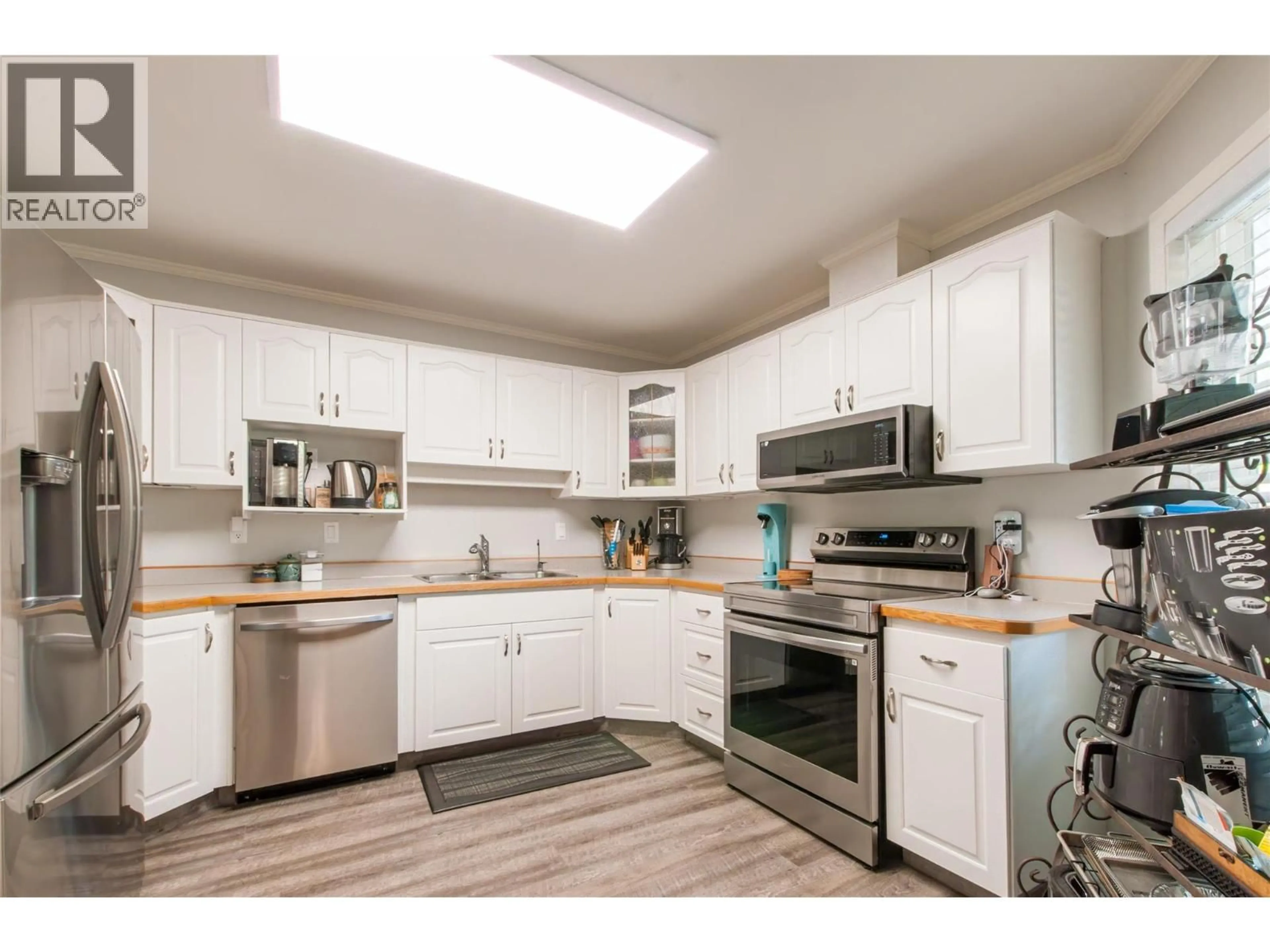 Open concept kitchen, unknown for 9 - 115 REDWING PLACE, Oliver British Columbia V0H1T4